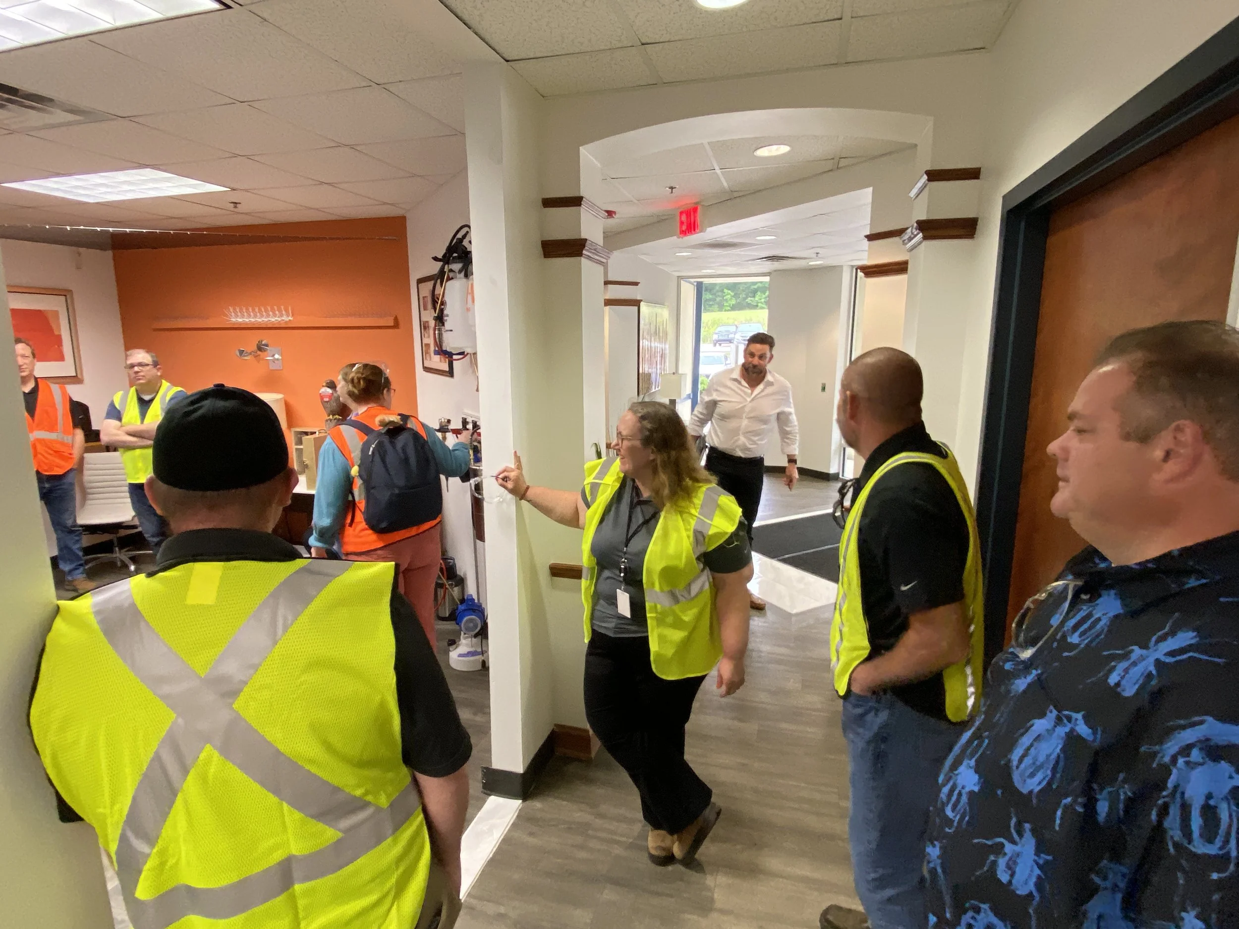 Anna Iverson supervising the donning of PPE before we tour the B&G facility.
