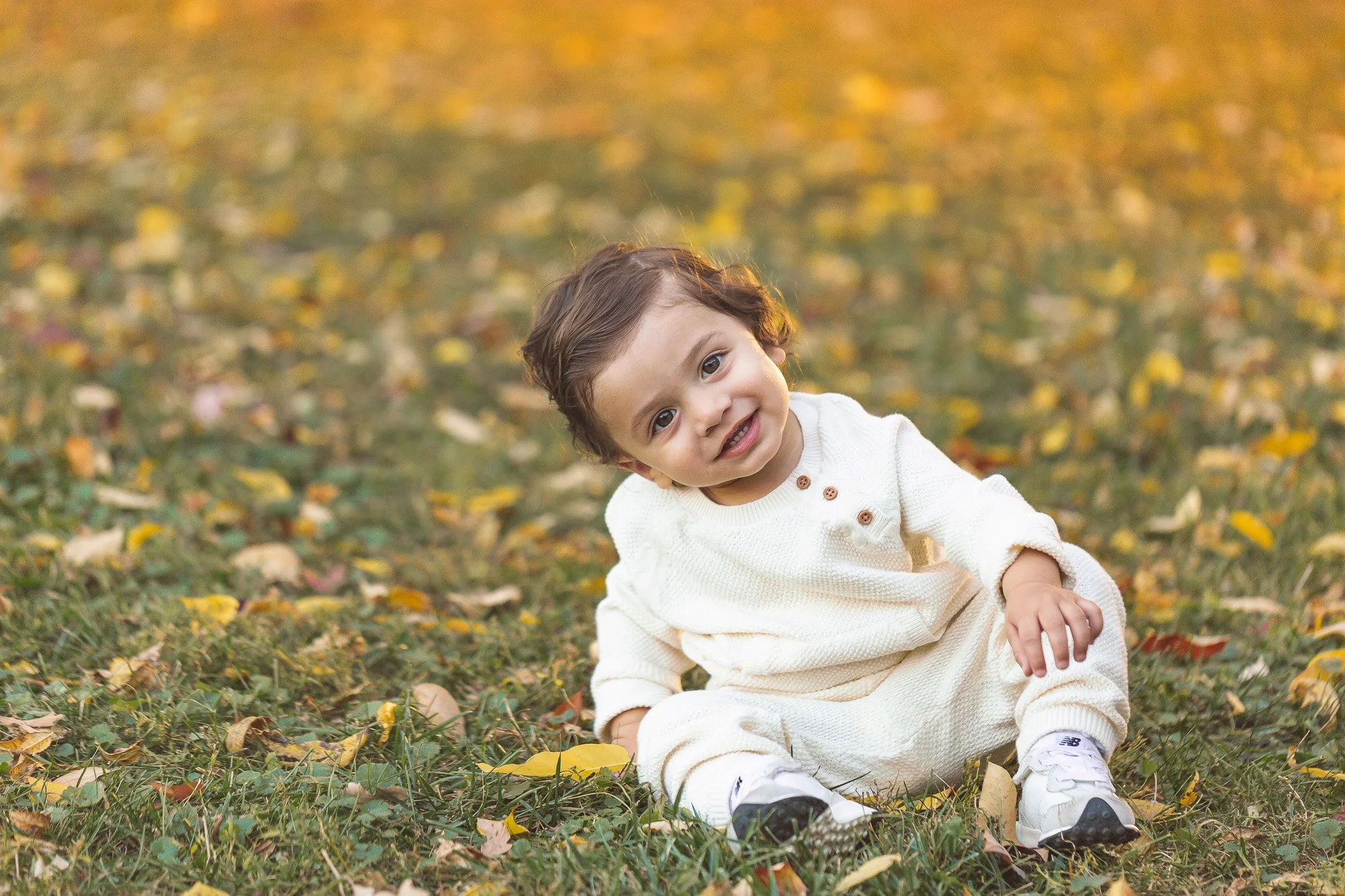 A photo of a child at a mini family photo shoot in Glen Ellyn, IL. Photographed by Heidi Aubin, family portrait photographer. 