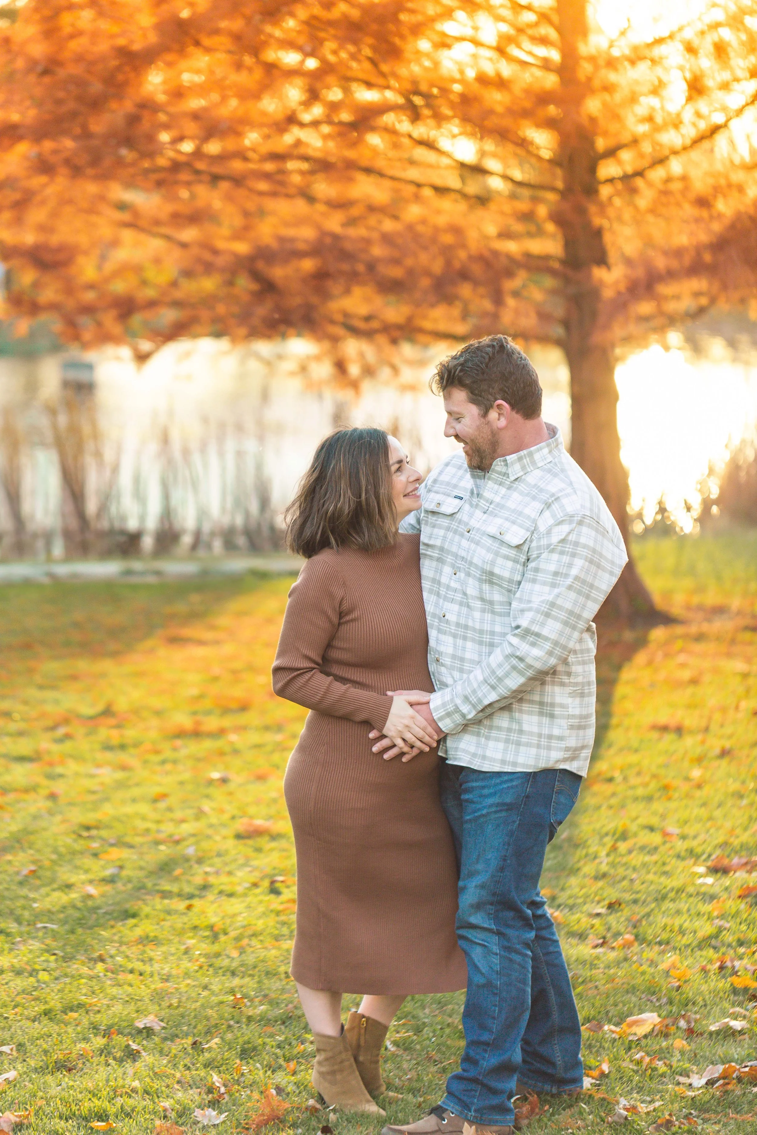 A photo of a couple expecting at a maternity photo shoot with Heidi Aubin, maternity photographer in Naperville, IL.