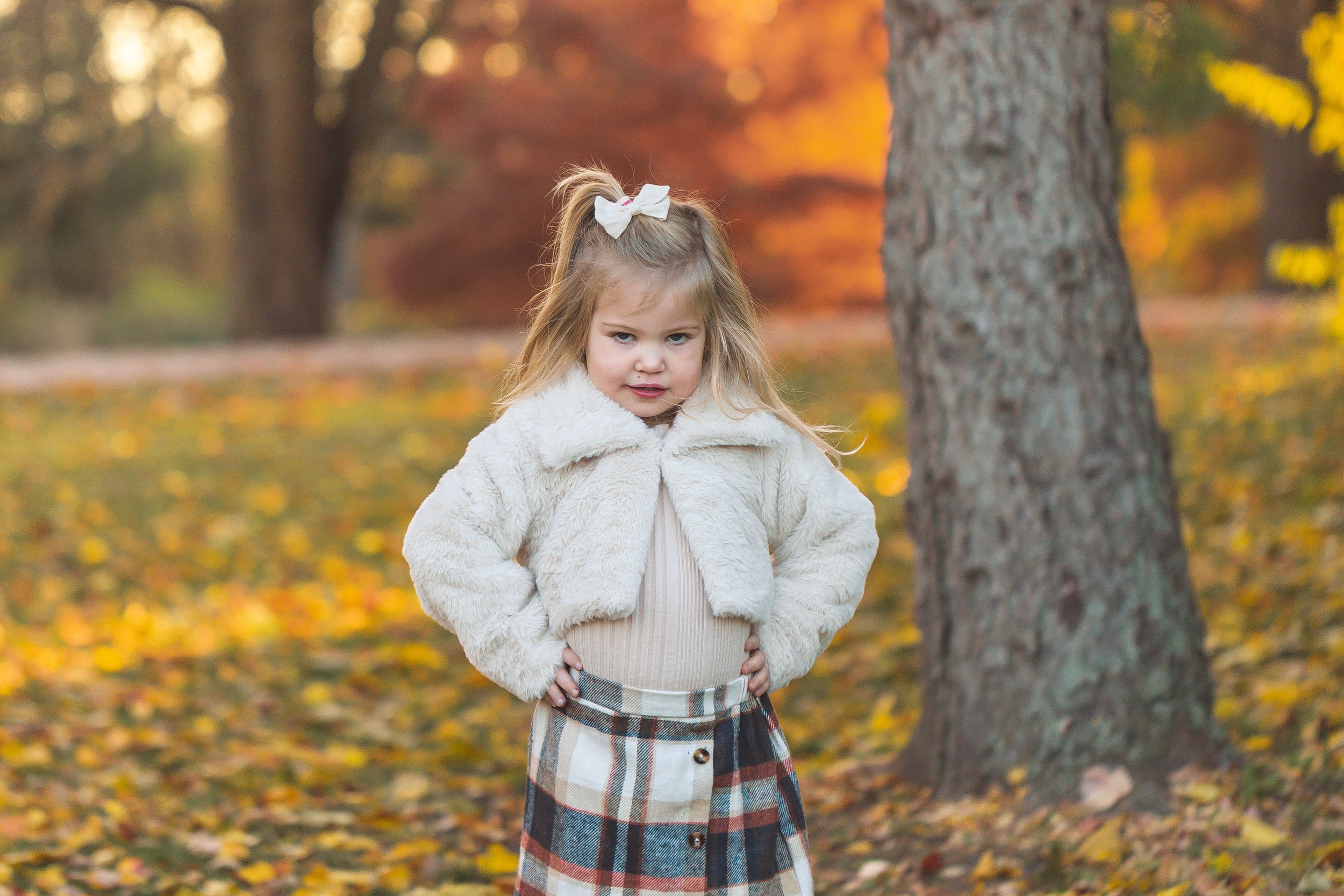 A photo of a child at a mini family photo shoot in Naperville, IL. Photographed by Heidi Aubin, family portrait photographer. 
