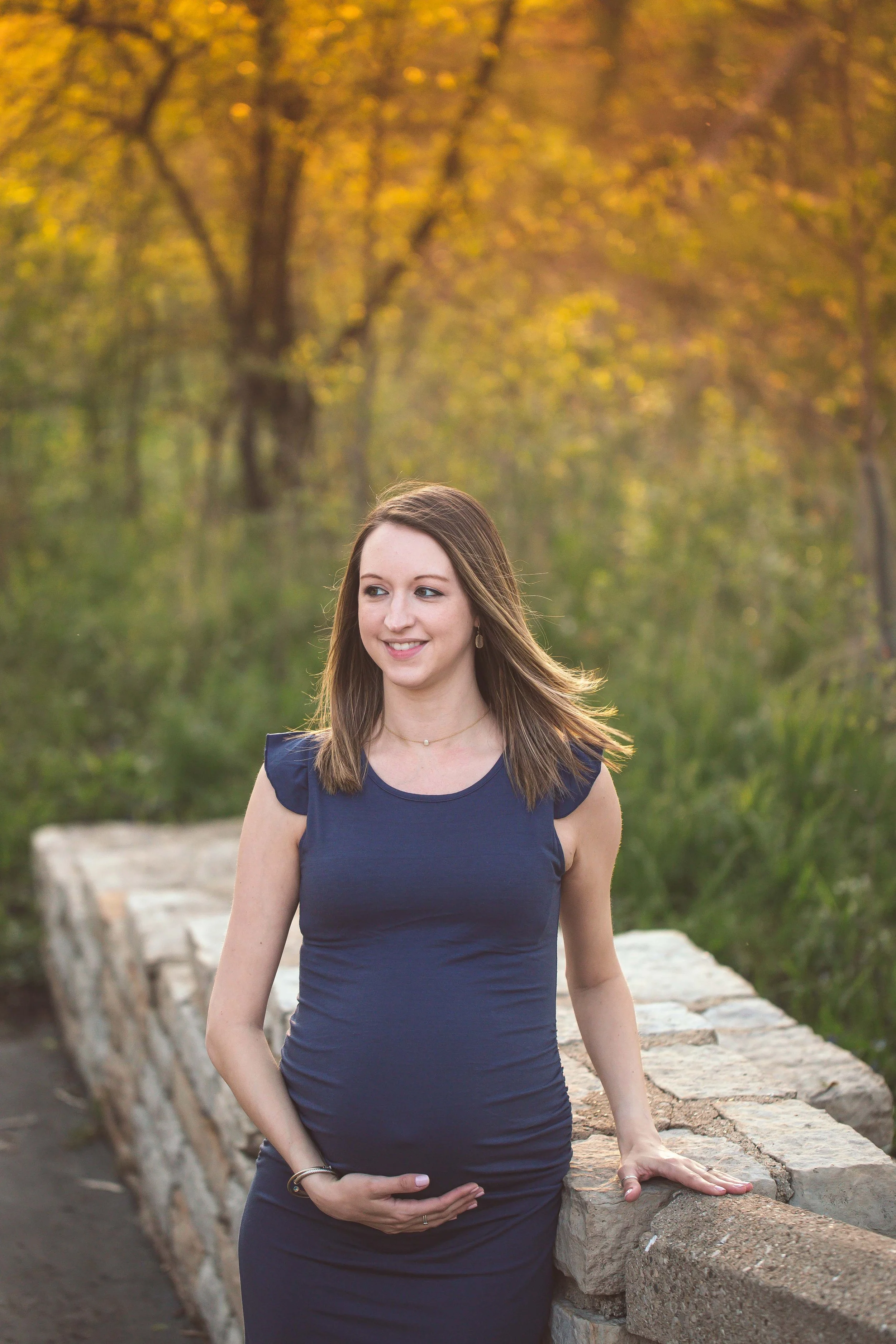 Photo of expecting mom at a maternity photo shoot with Heidi Aubin, maternity photographer in Glen Ellyn, IL.