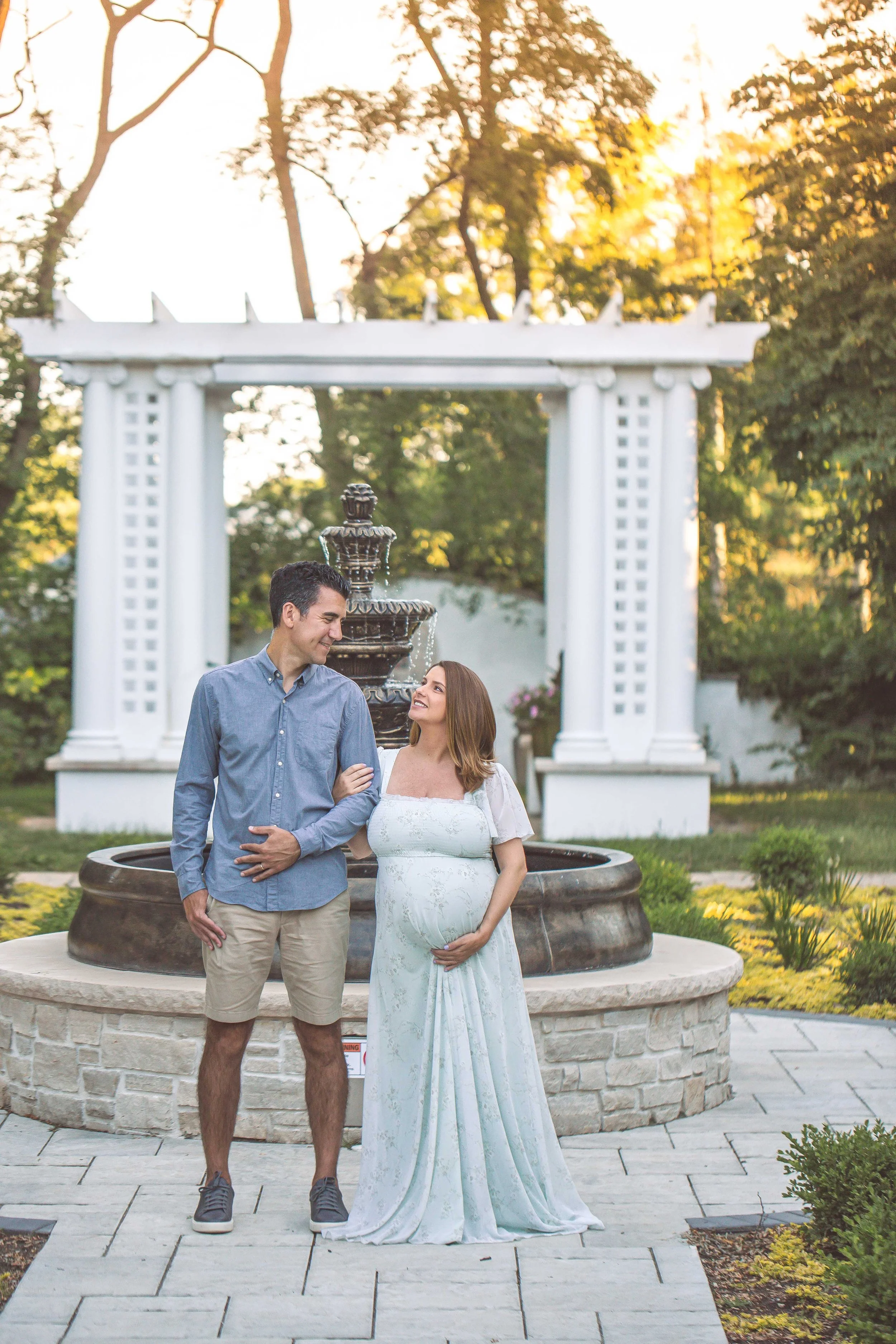 A maternity photo during a maternity photo session at Hurley Gardens in Wheaton, IL with Heidi Aubin.