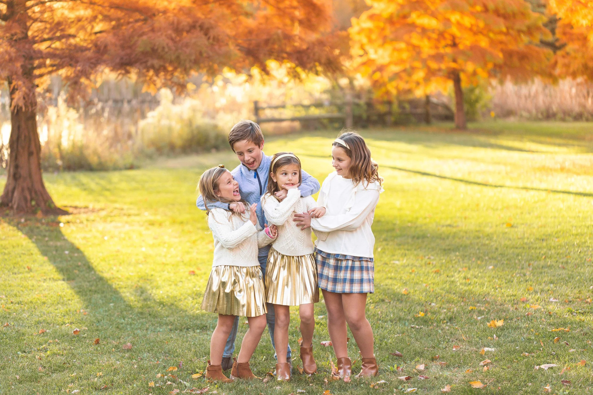 Candid sibling photo at a family photo shoot in Naperville IL.