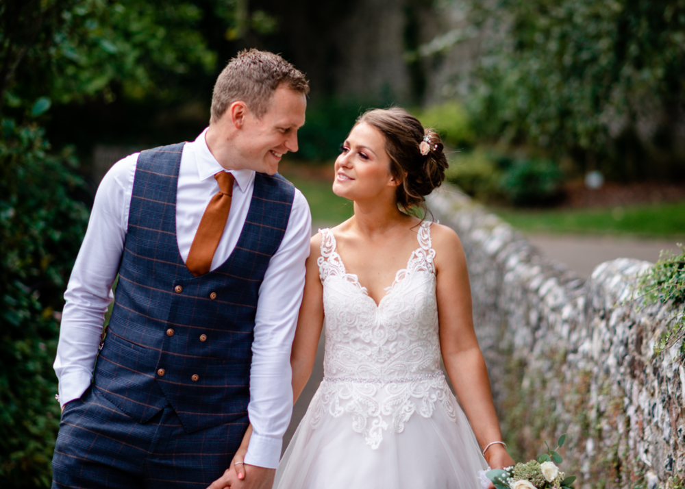 Bride and Groom walking In Winchester.PNG