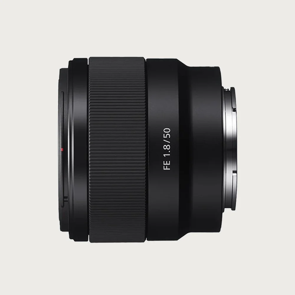 50mm camera lens with f/1.8 aperture, side view, black