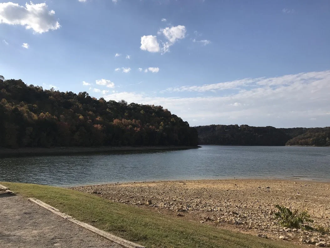 Scenic shoreline view of Dale Hollow Lake surrounded by rolling Upper Cumberland hills near Livingston Tennessee
