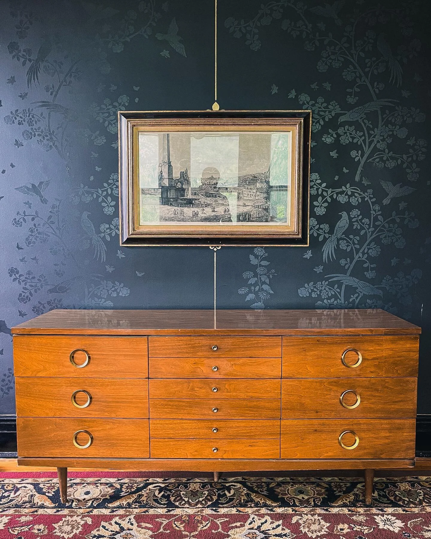 Our living room is finally coming together! We decided to go with stencils from @cuttingedgestencils and they really make the room stand out. The wall color is Valspar Noir in a flat sheen while the stencil is the same color but in a semi-gloss. We l