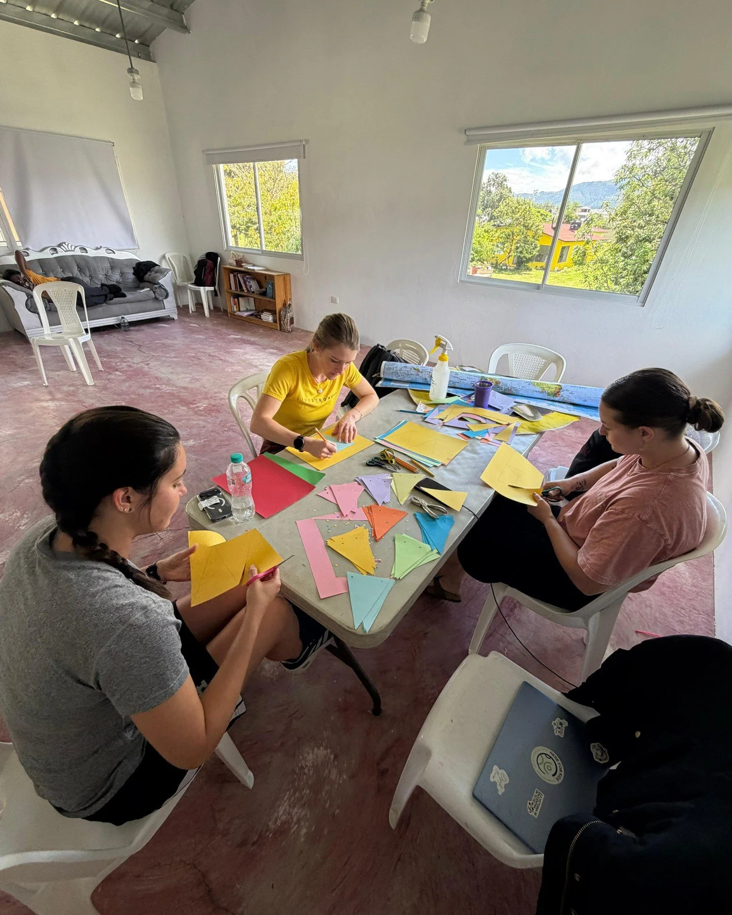 Constanza Day 4: We started the morning at the school, continuing to serve as teacher aides in kindergarten, English, Science, and Math. We helped with tutoring and worked on crafts for the teachers, including card making, a solar system, banners, an