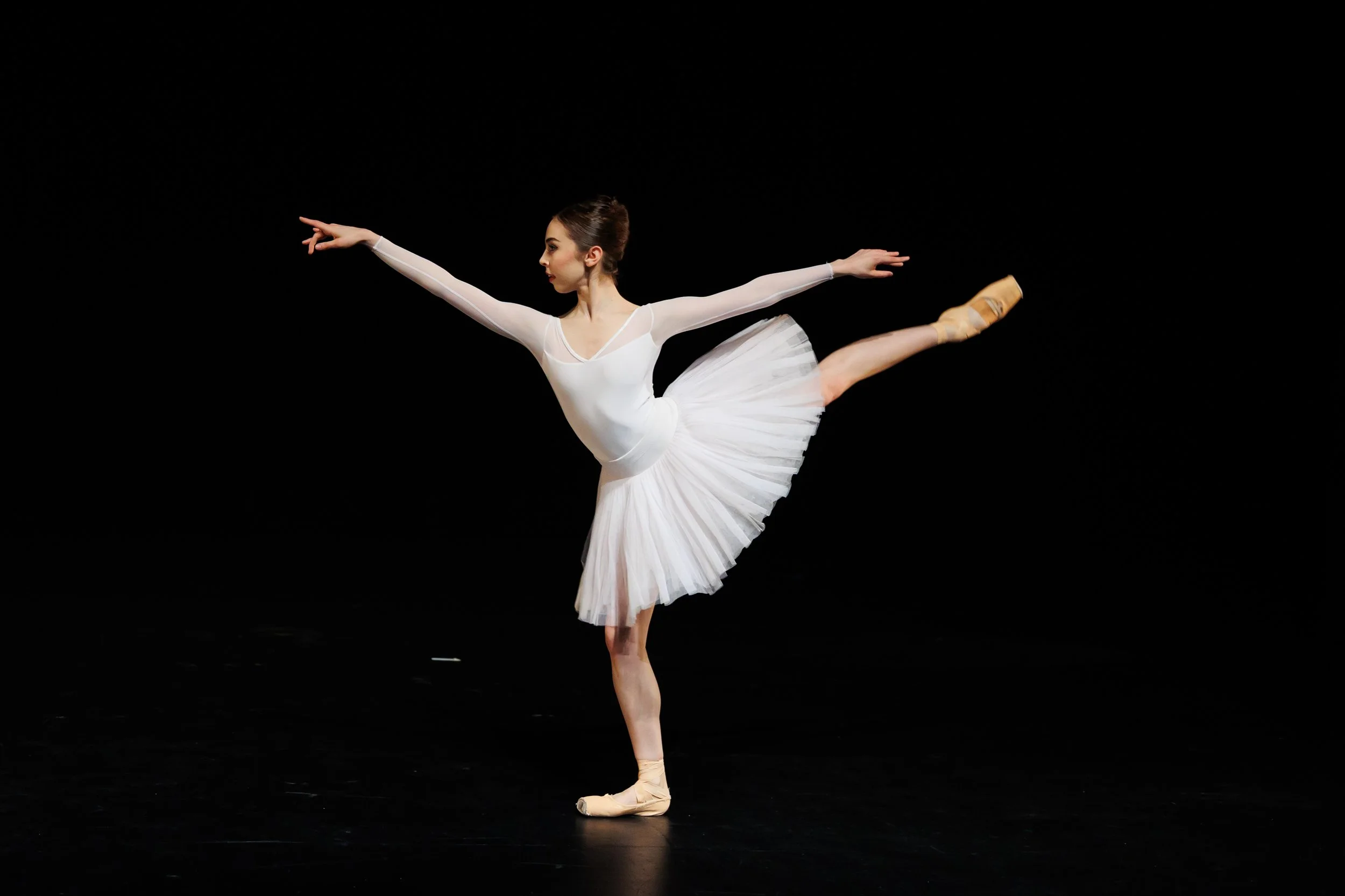 Alice McArthur in an arabesque en fondu. Guest performance for Collab-25
