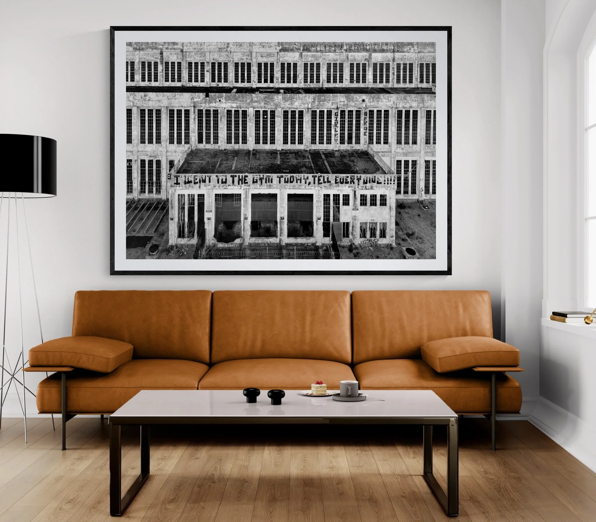 Minimalist living room with a leather sofa.jpeg