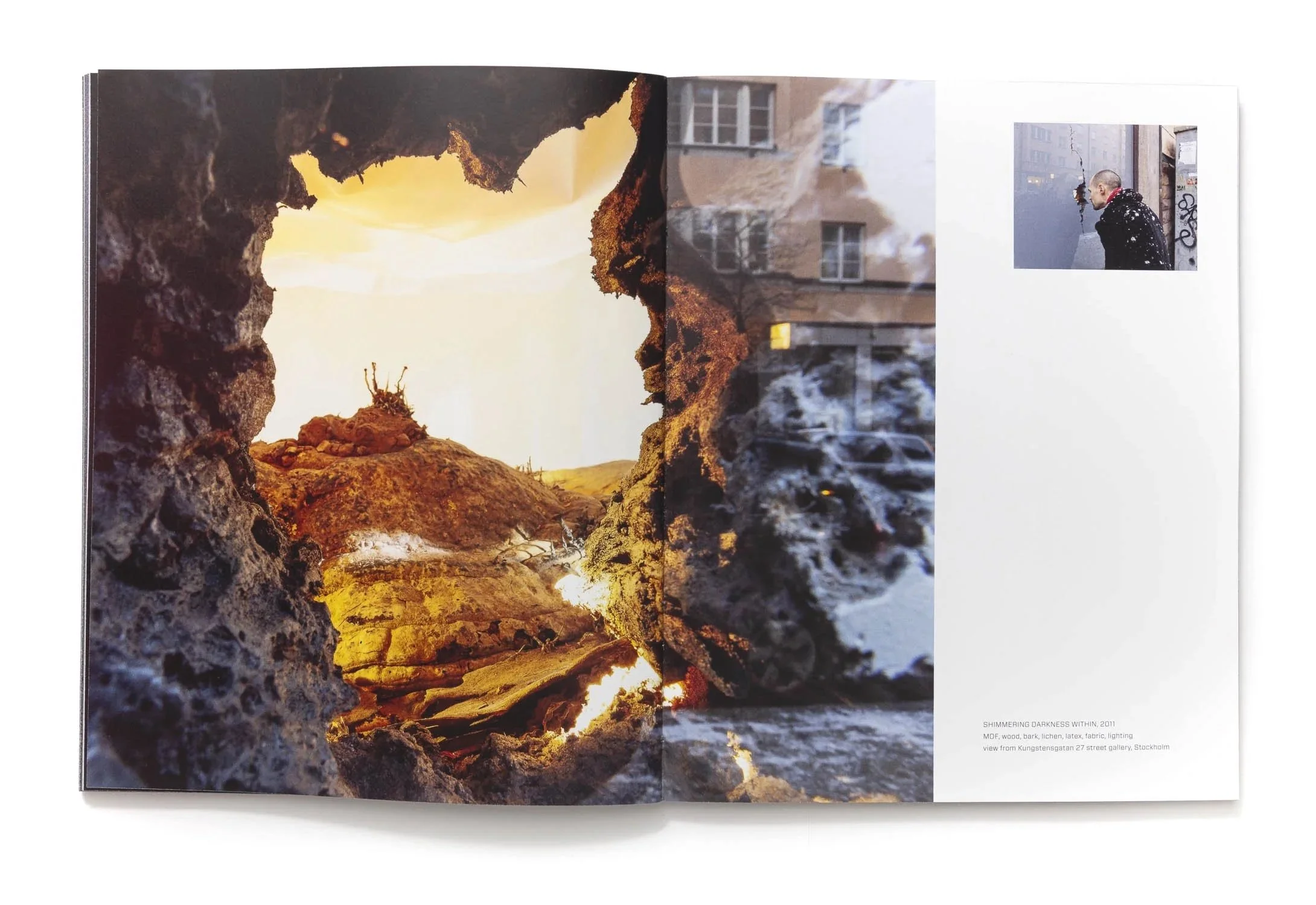 Spread from the publication Concealed Landscapes about Oscar Furbacken's art, by Faethon Press 2025. Street window installation in Stockholm.