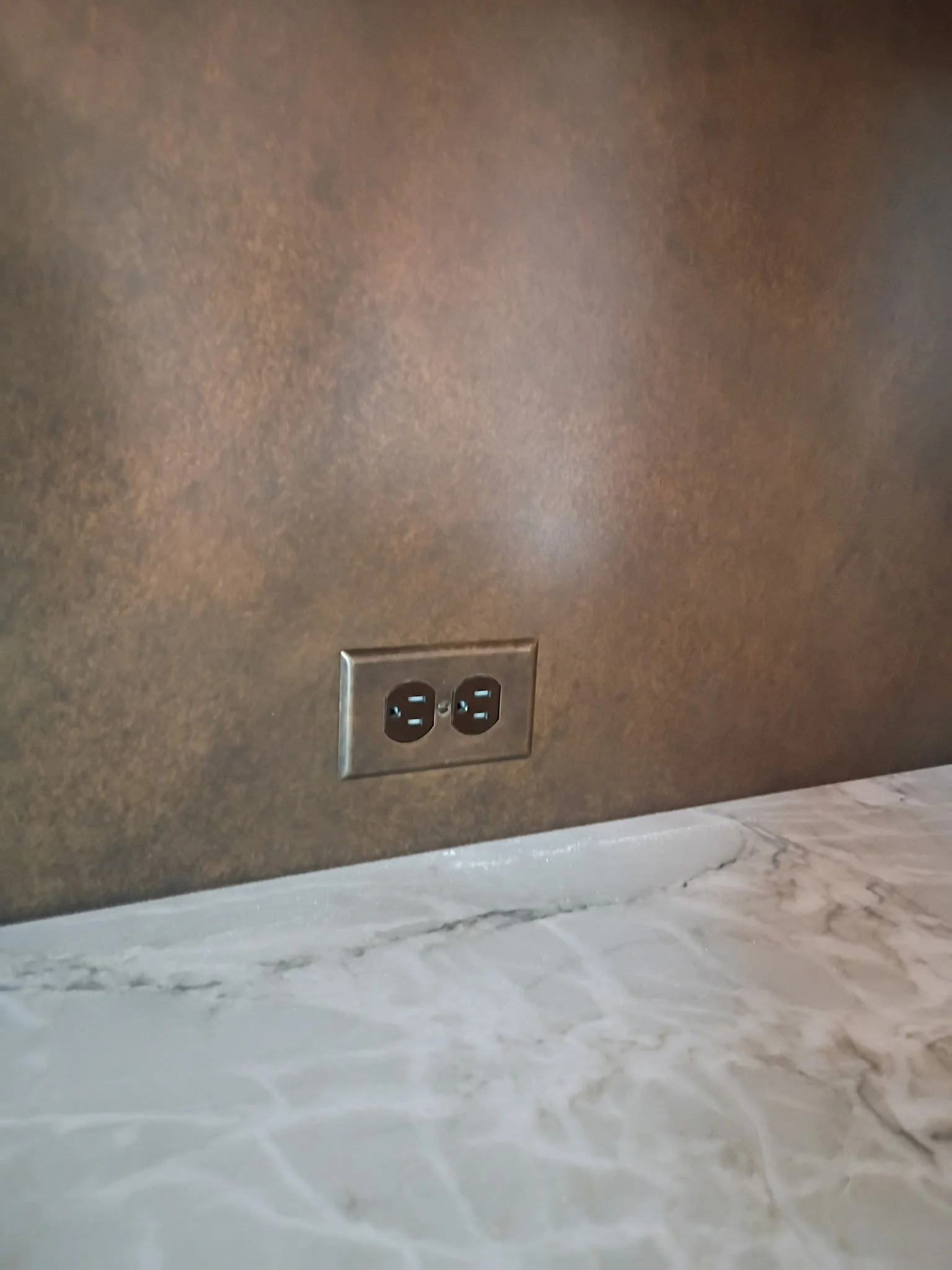 Patinated Brass Backsplash - Detail