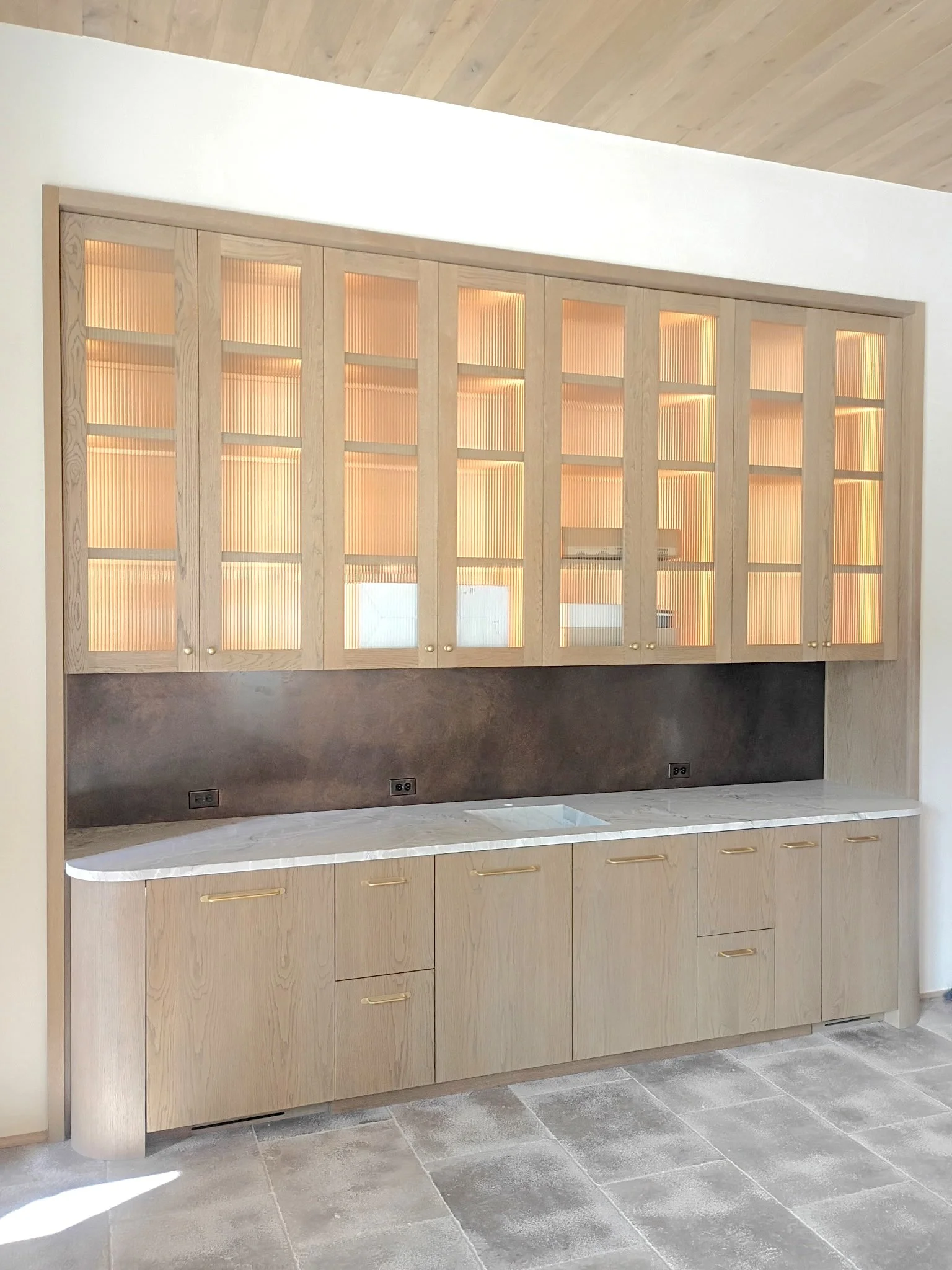 Patinated Brass Backsplash