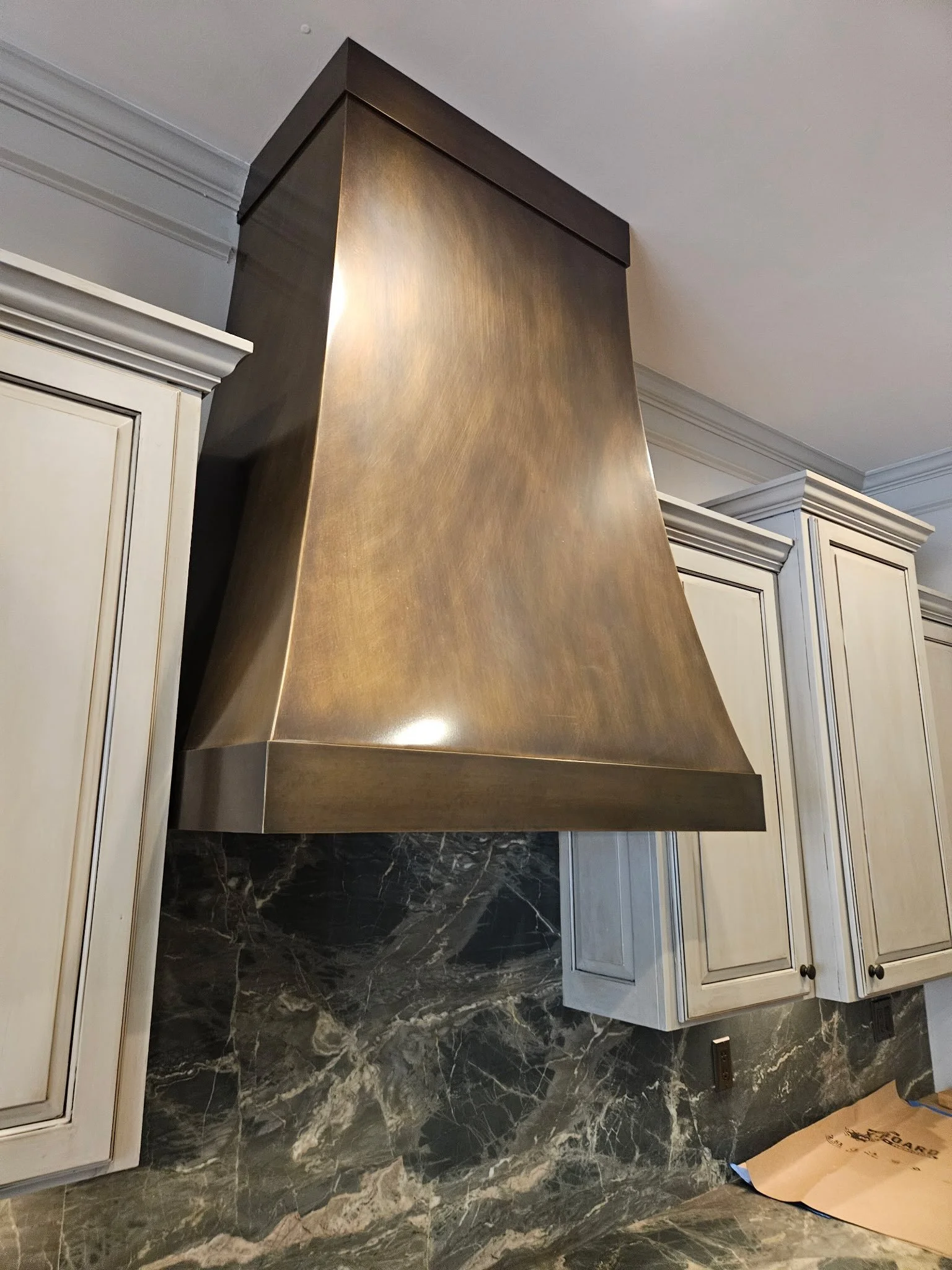 So proud of Team LDC on this all brass hood. The client wanted a certain warm leathery brown look for the finish. I would say that was definitely achieved! We love making custom hoods! Lets make one for you 🤓! #custombrasswork #custommetalwork #ldcm