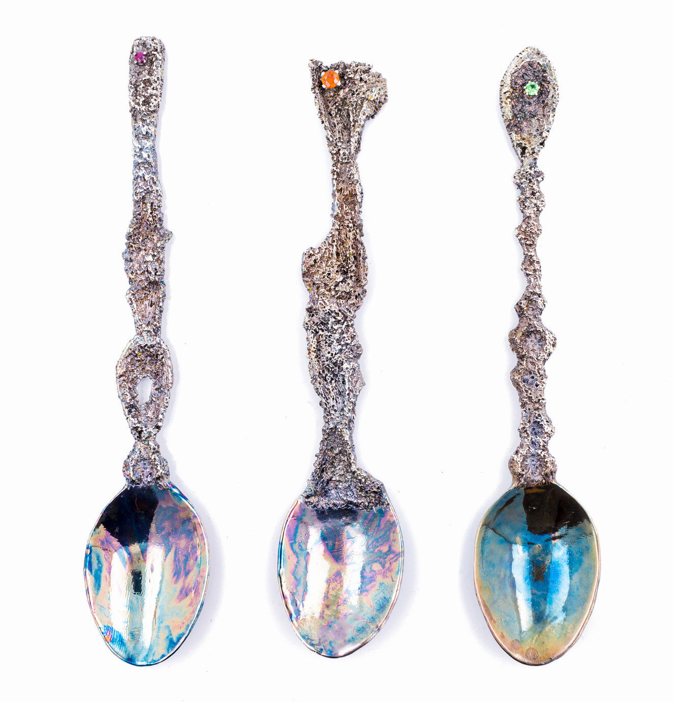 Graceful Inner Islands Spoons / Sterling silver, ruby, spessartite garnet, tsavorite garnet, patina. 