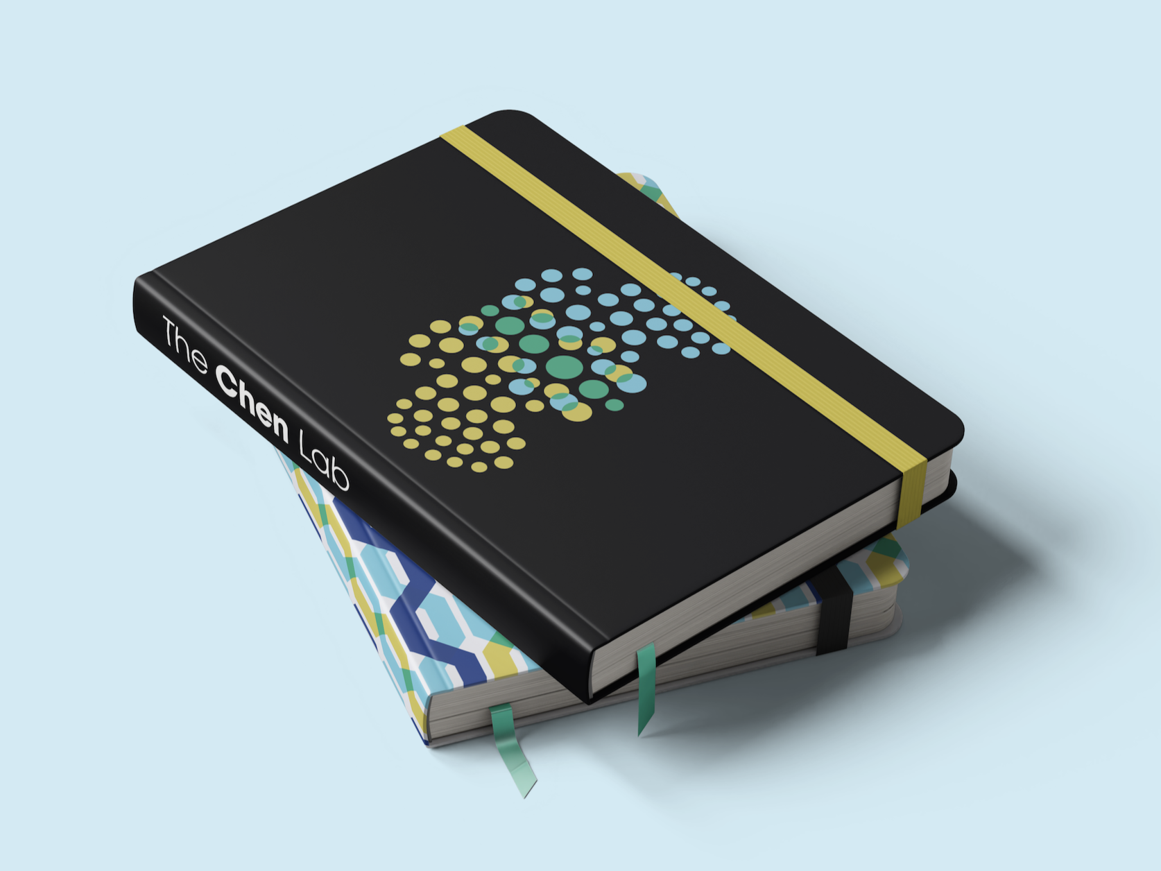 Mockup of two lab notebooks stacked on top of each other featuring custom lab branding and logo for the Chen Lab