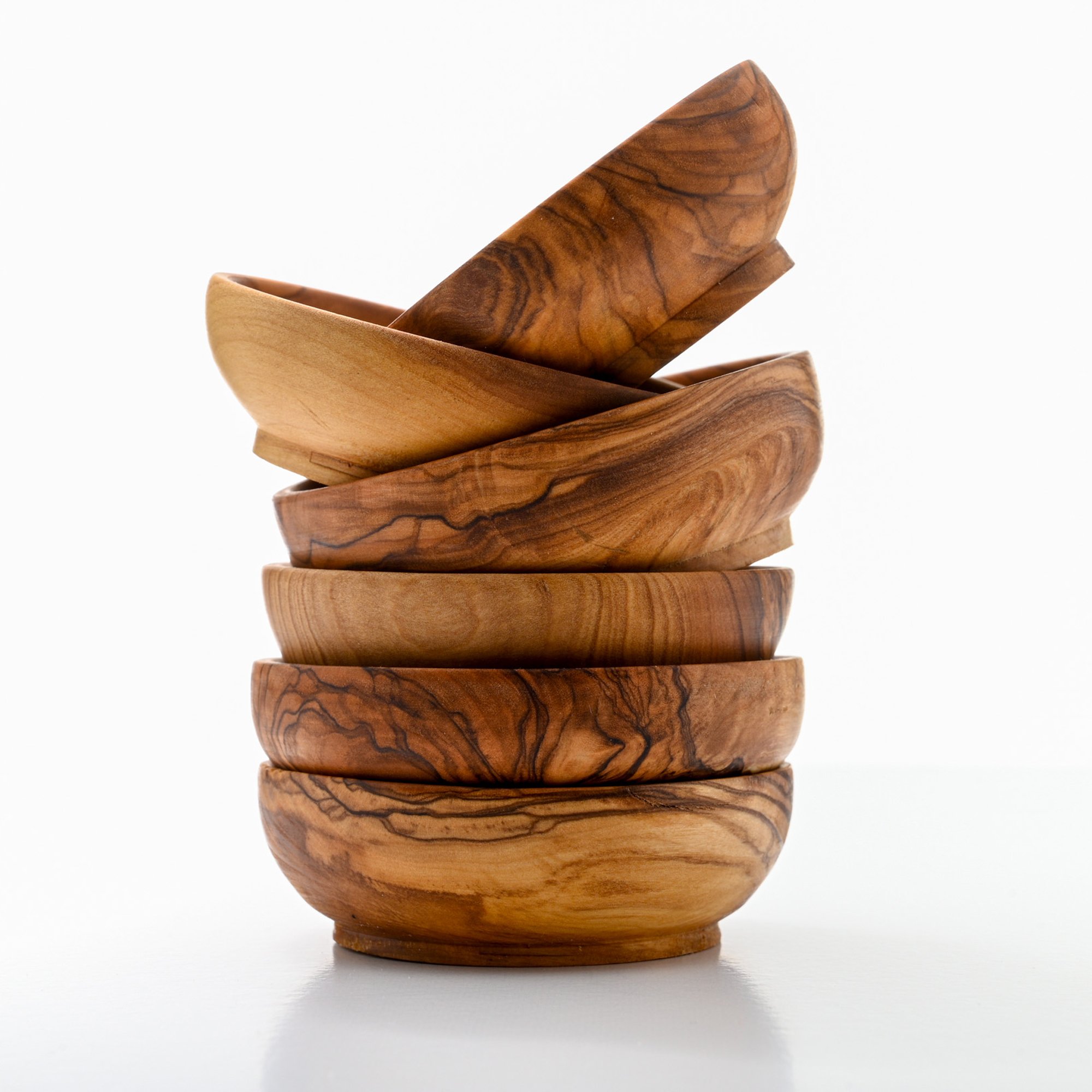  Stack of wood serving bowls on white background 