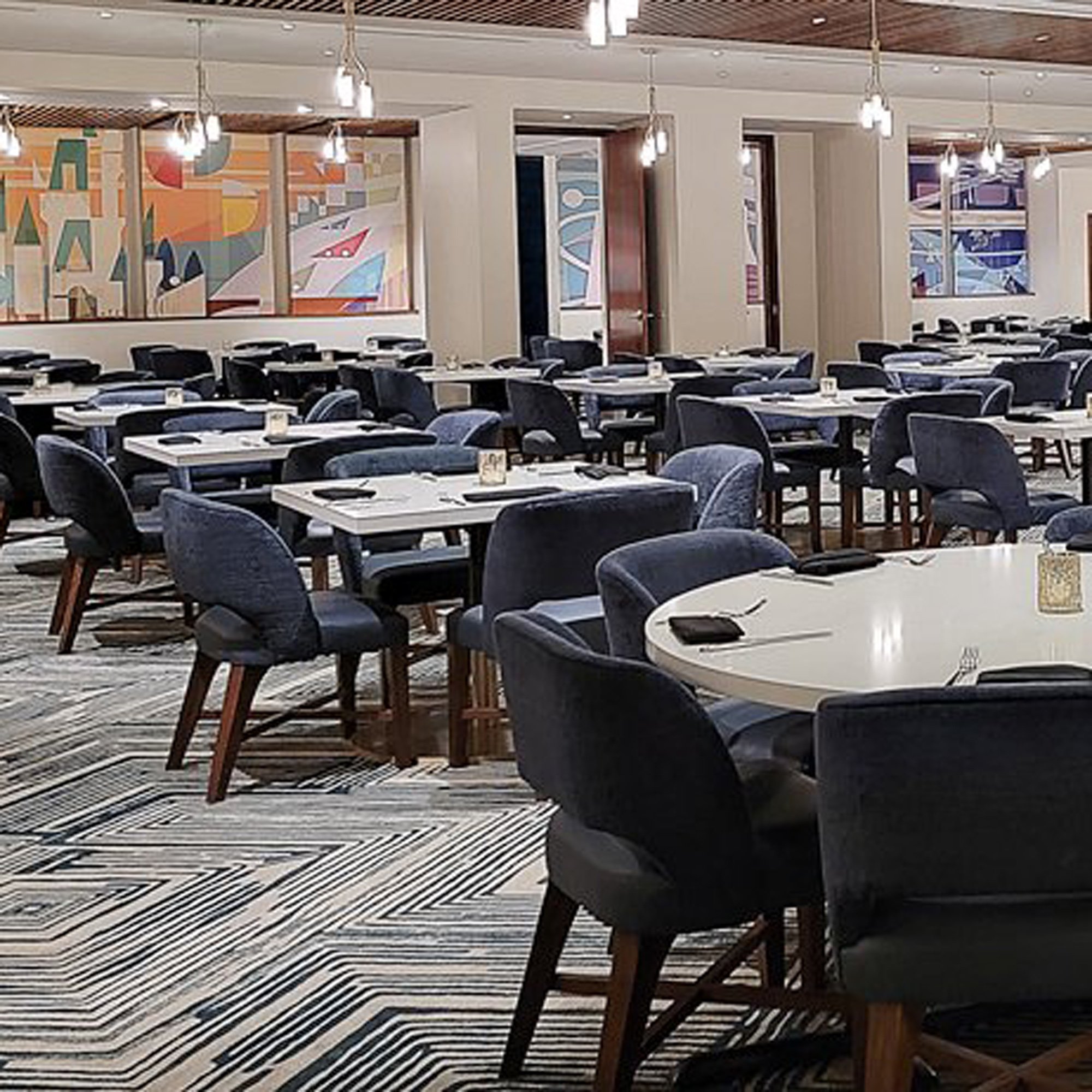  commercial real estate photography, a dining room photographed ready for the day of hungry customers  