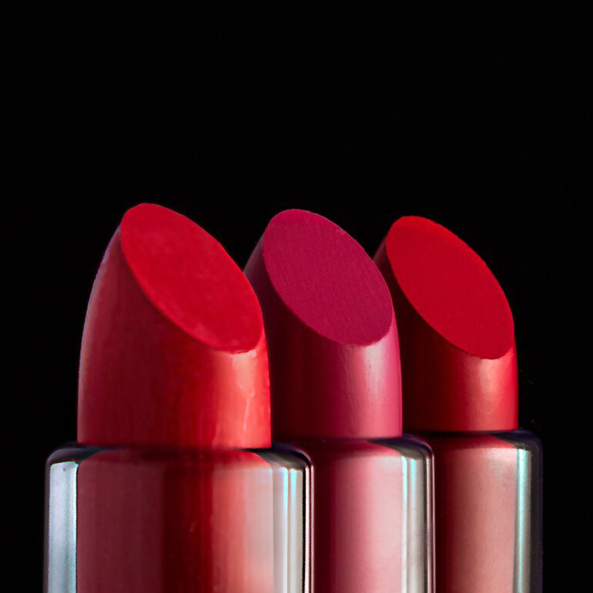  Dramatic dark background used to make red lipstick stand out  
