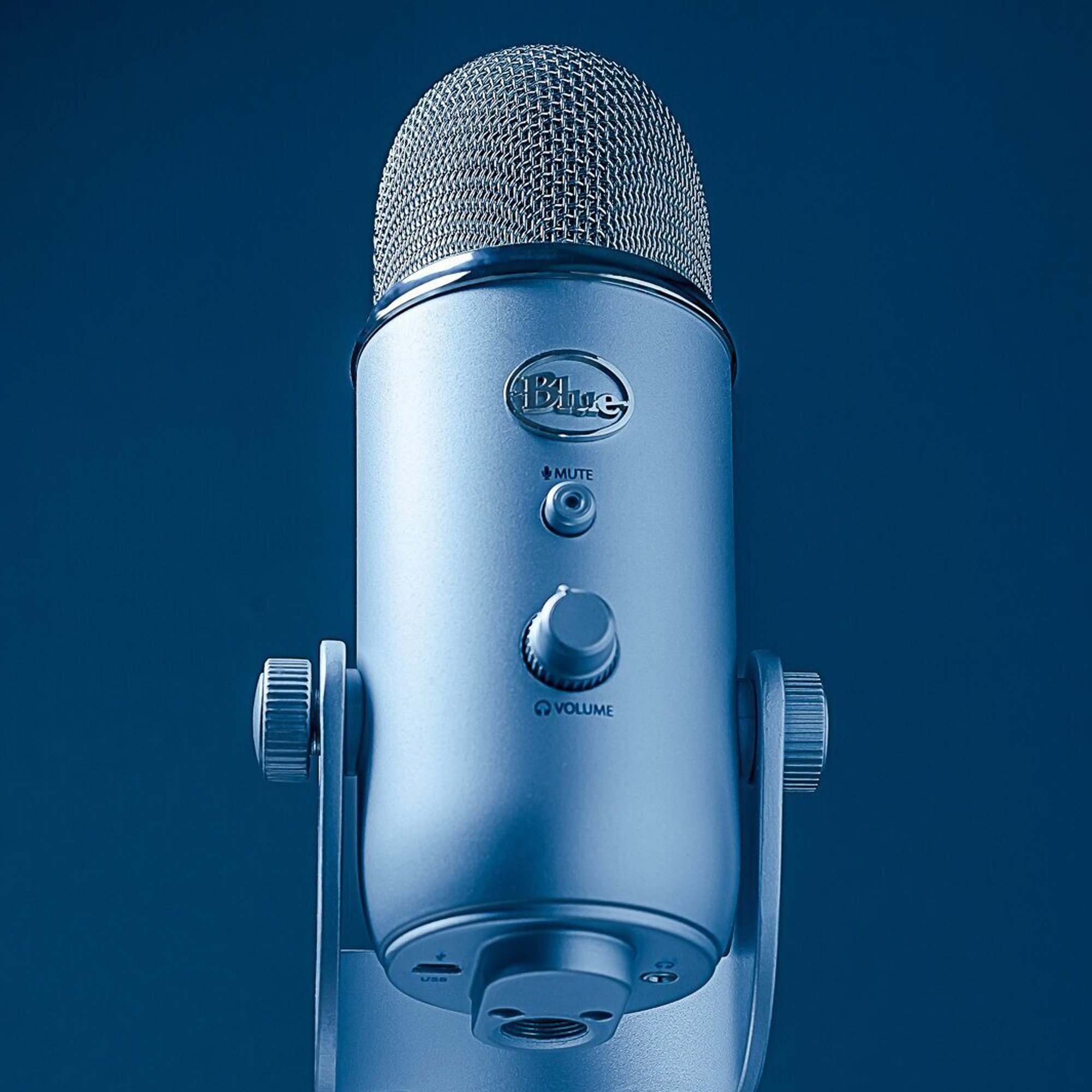  Yetti microphone lit with an electric blue light.  