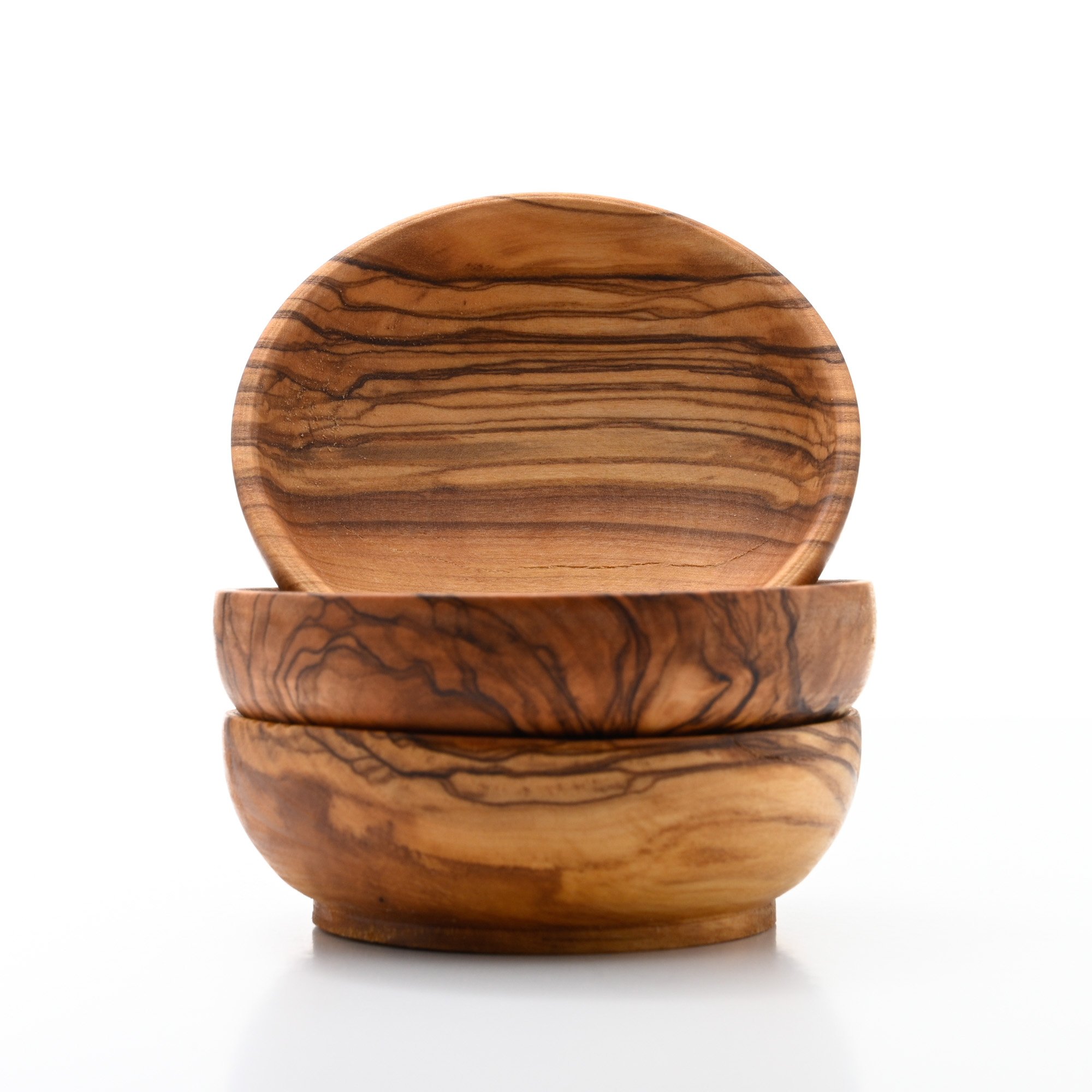  Three wood bowls ttacked with the top bowl showing the inside detail of the boel, all against a pure white background 