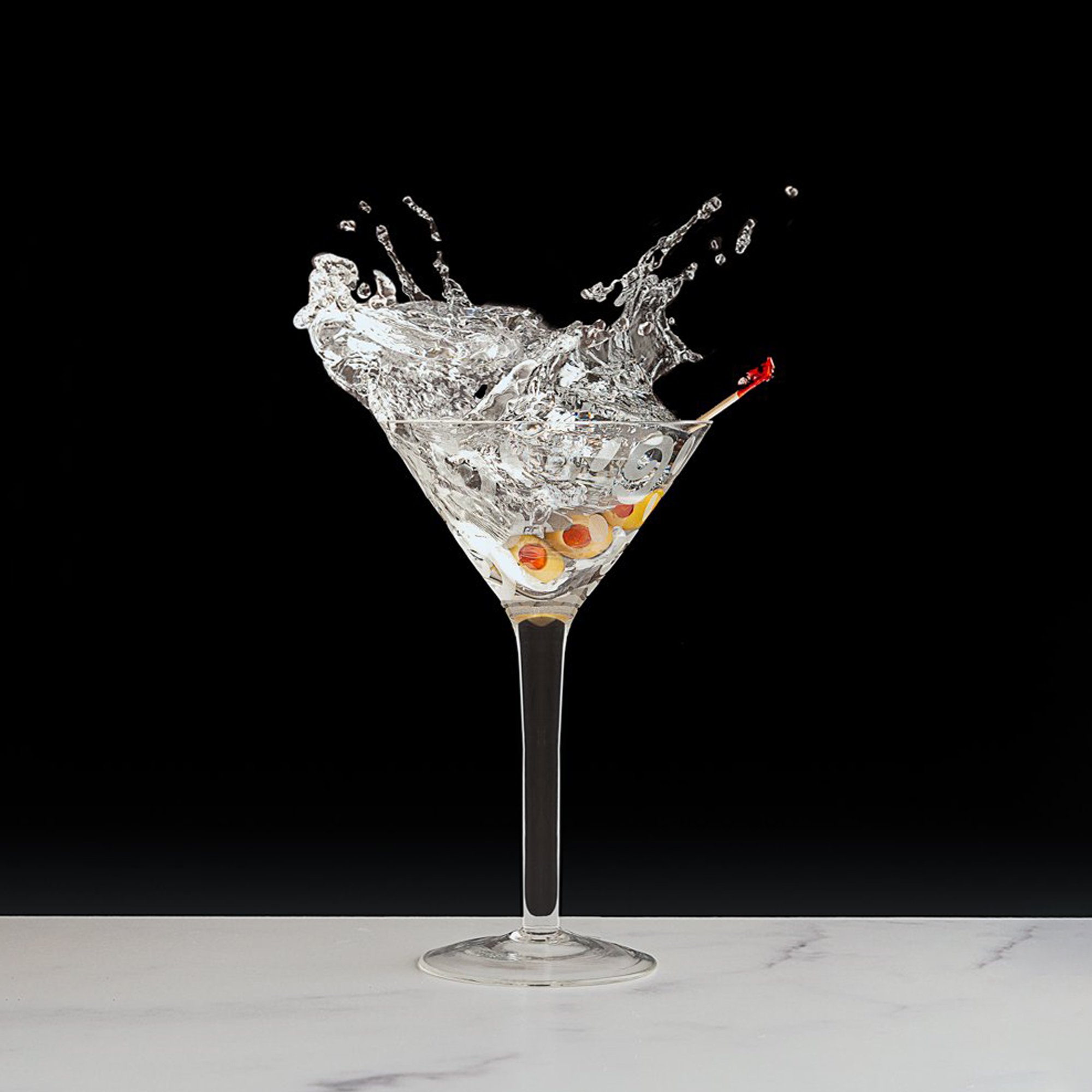  martini splash against a black background 