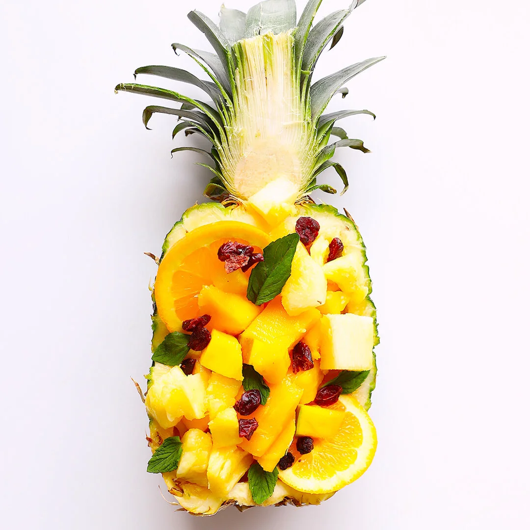 FRUIT SALAD IN A pineapple BOAT