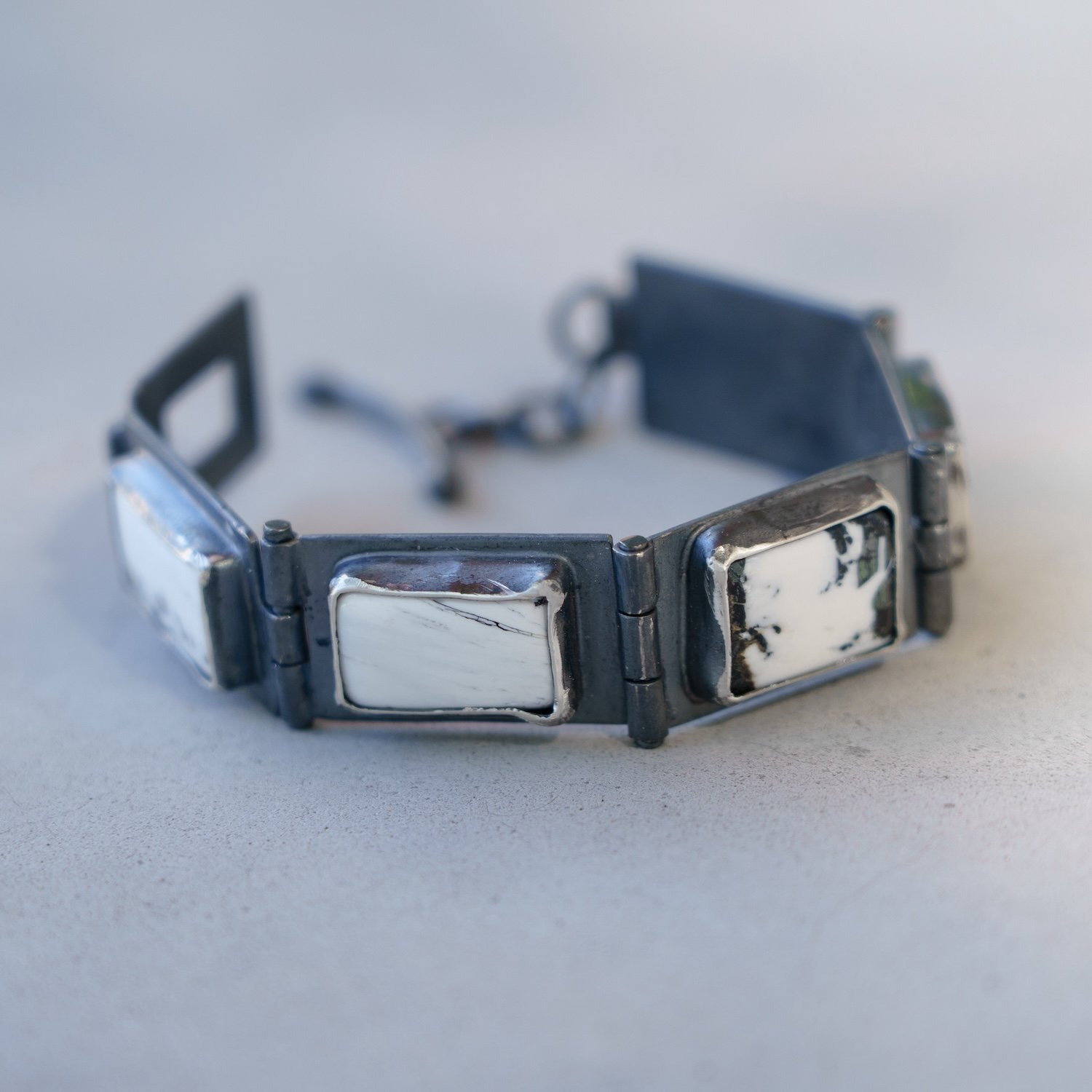Hinged Bracelet:White Buffalo on blackened SS links #5.jpg