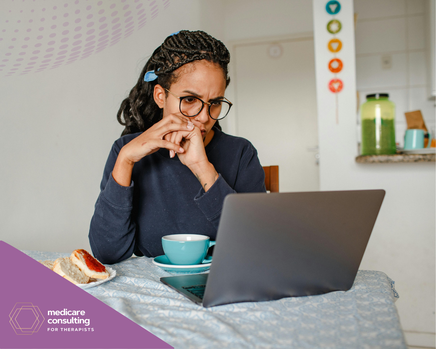 woman looking at laptop
