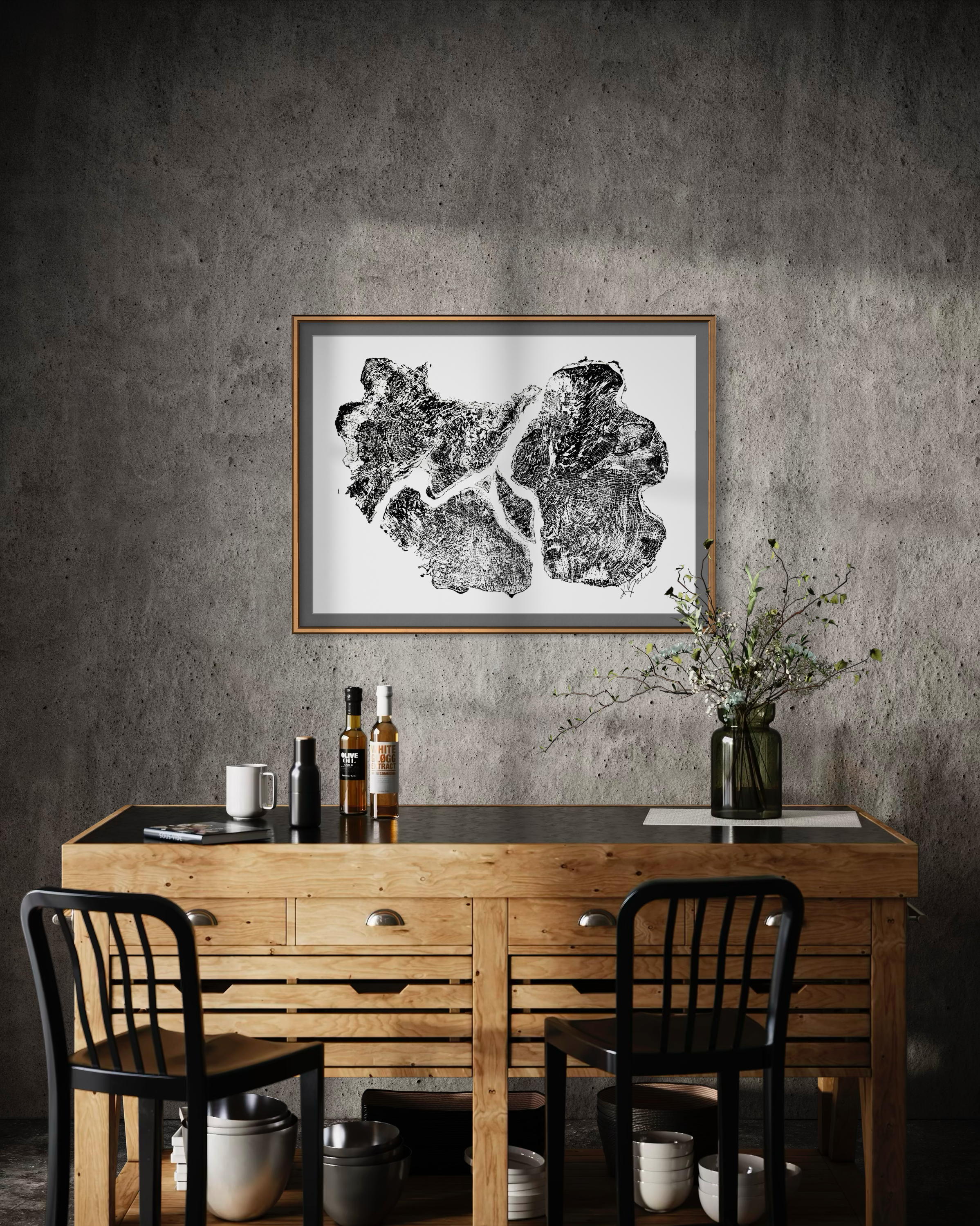 Interior scene with a framed black and white tree ring design, hanging above a wooden sideboard against a concrete wall.