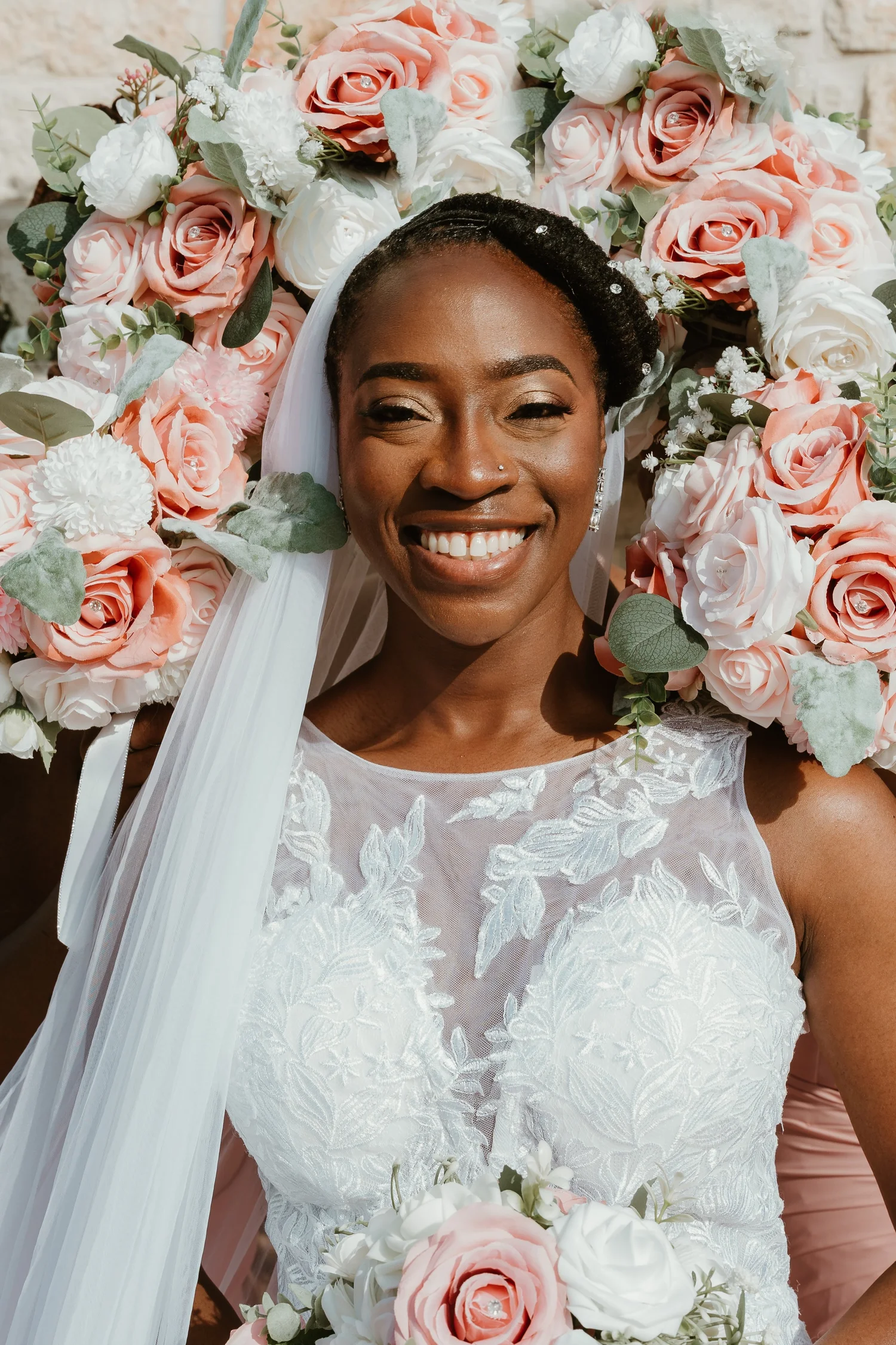 Bride surrounded by flowers
