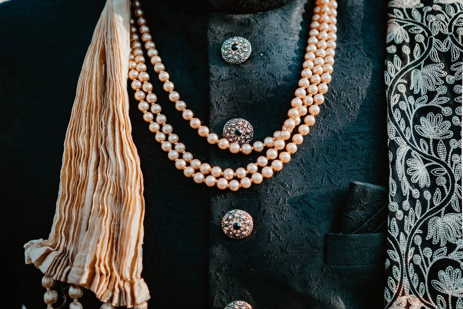 Pearl and embroidered wedding attire details