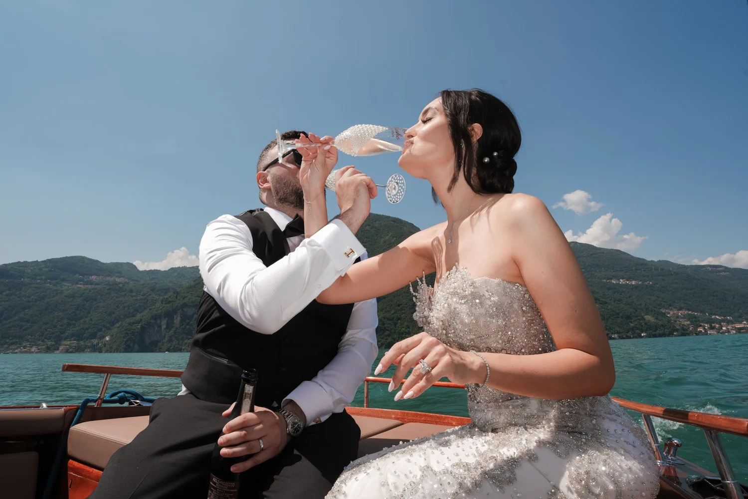 Newlyweds celebrating on a boat
