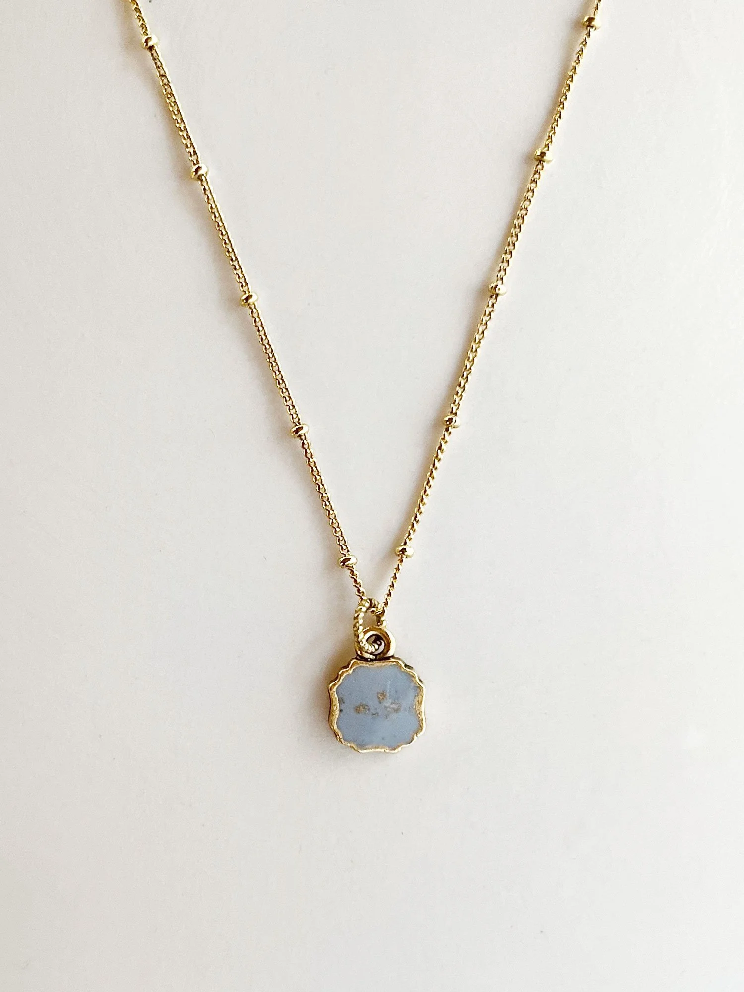 Lucky Necklace on gold satellite chain in millenial gray