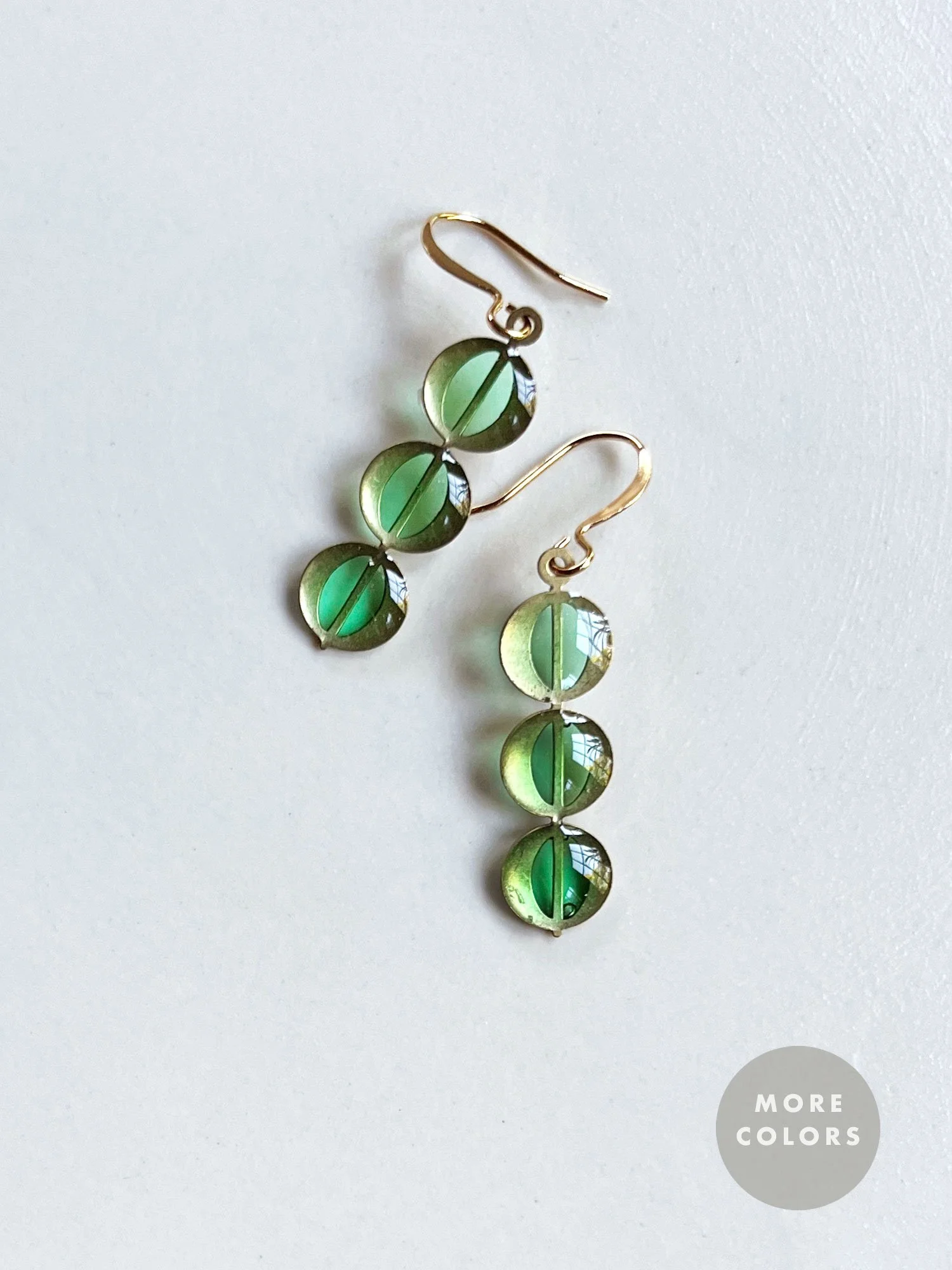 Trio circle earrings with apple green color.