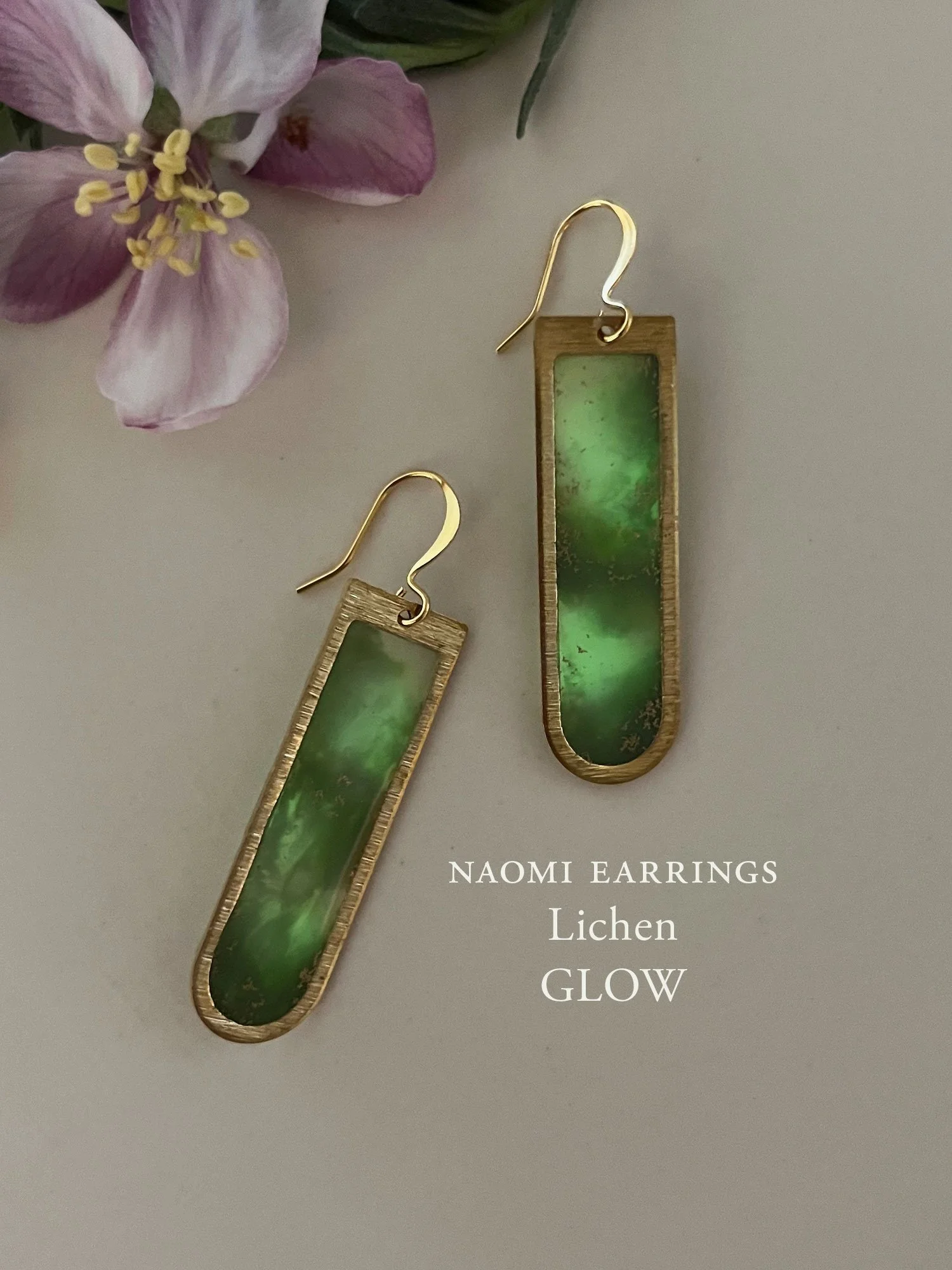 The Naomi Earrings in Lichen glow in the dark