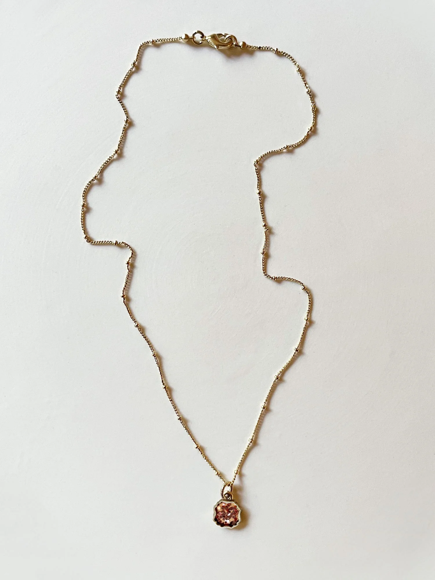 The Lucky Necklace is on an 18" satellite chain