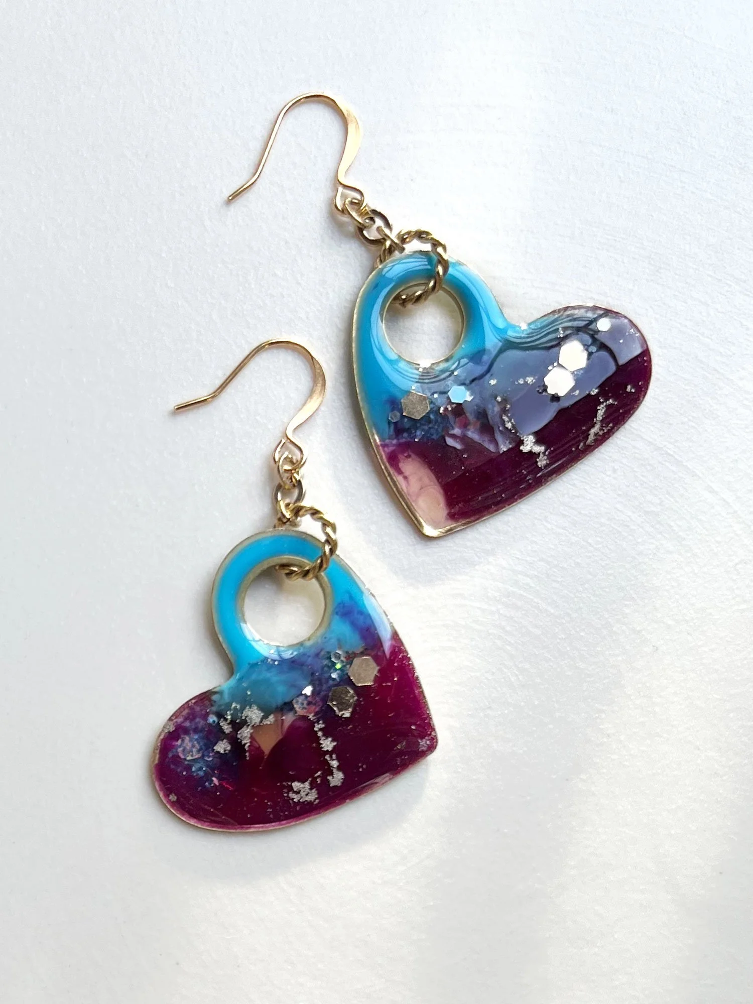 Large blue and purple heart earrings with sparkle