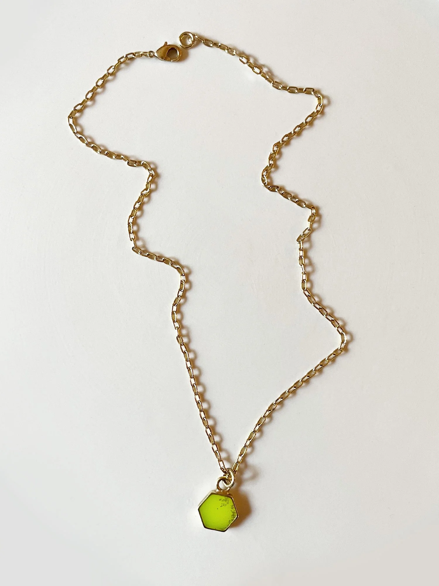 The hexagon necklace is 18" long