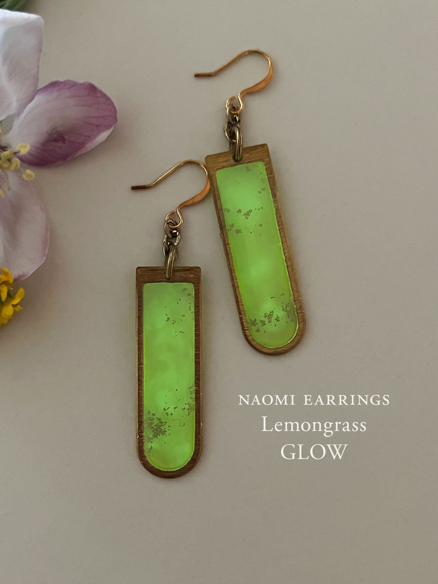 The Naomi Earrings in Lemongrass glow in the dark
