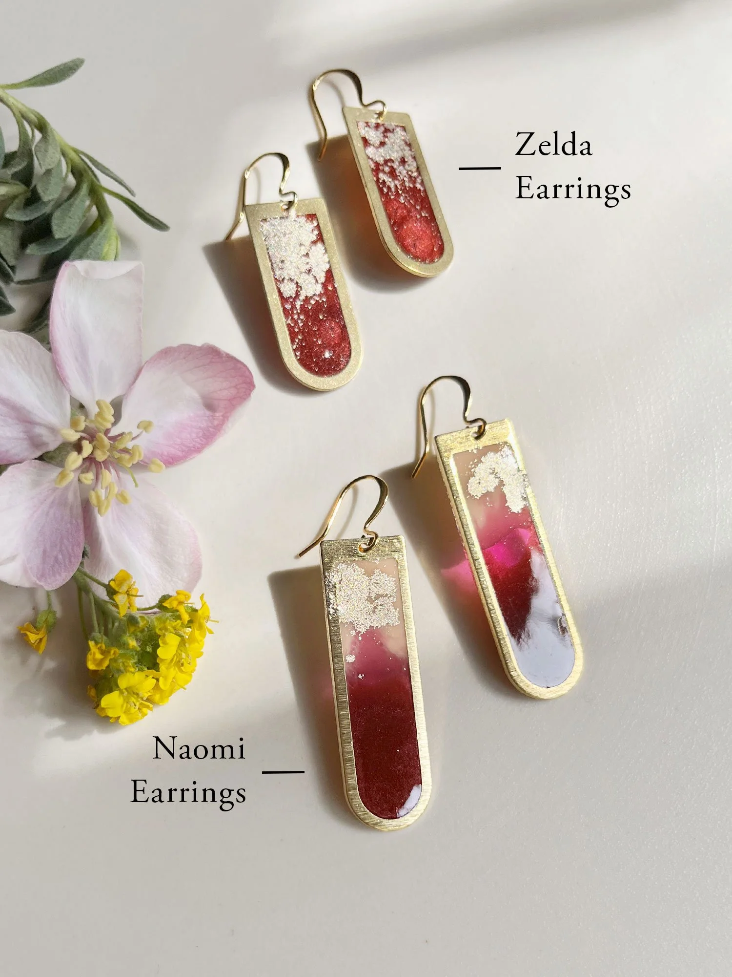 Diagram showing Zelda and Naomi Earrings in reds