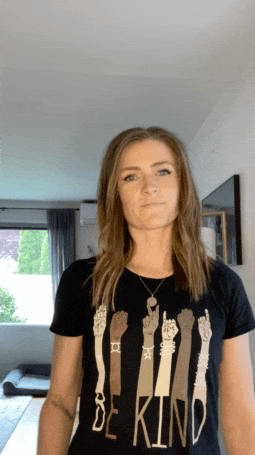 Spelling out “Be Kind” in ASL, as shown on my shirt