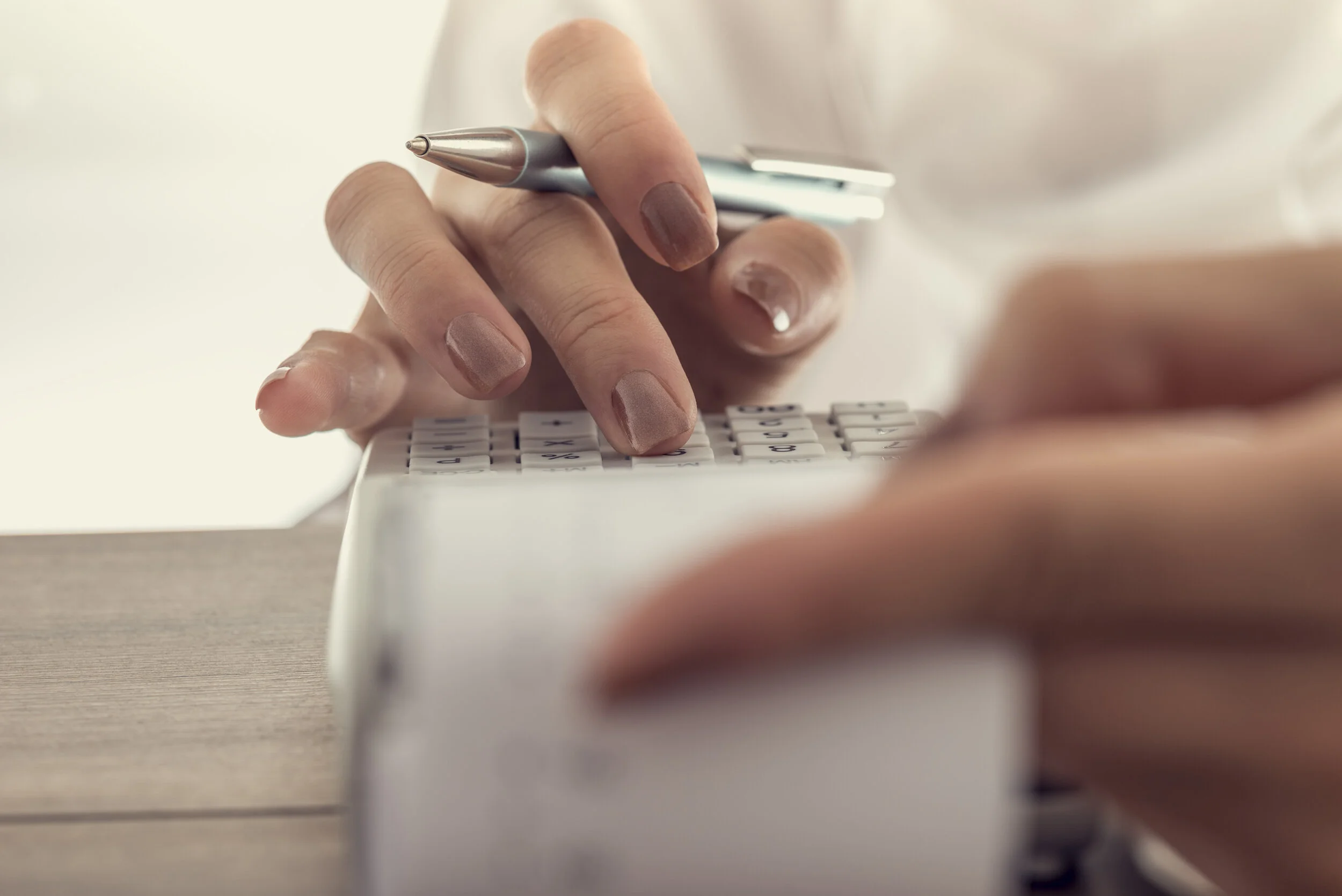 closeup-low-angle-view-of-a-woman-using-a-manual-.jpeg