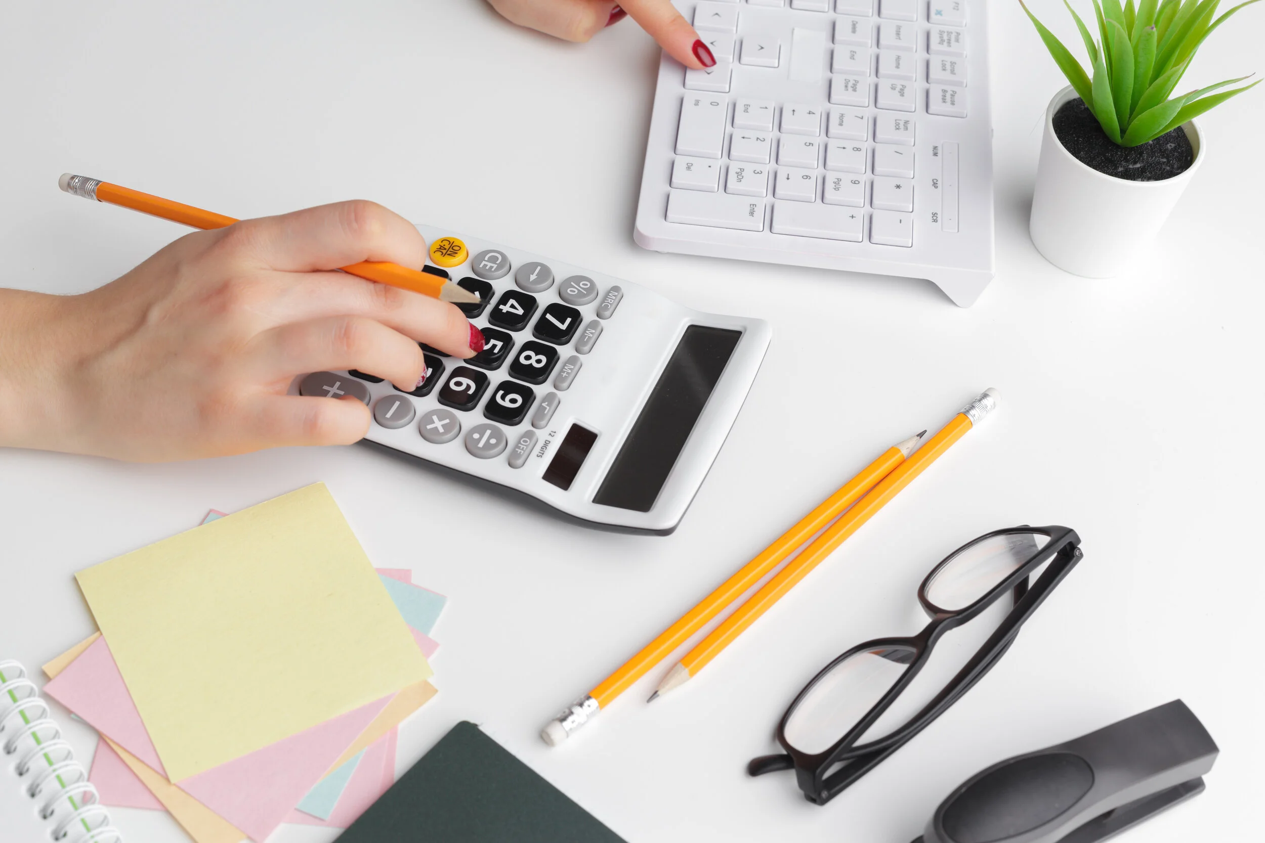business-woman-working-with-financial-data-hand-us.jpeg