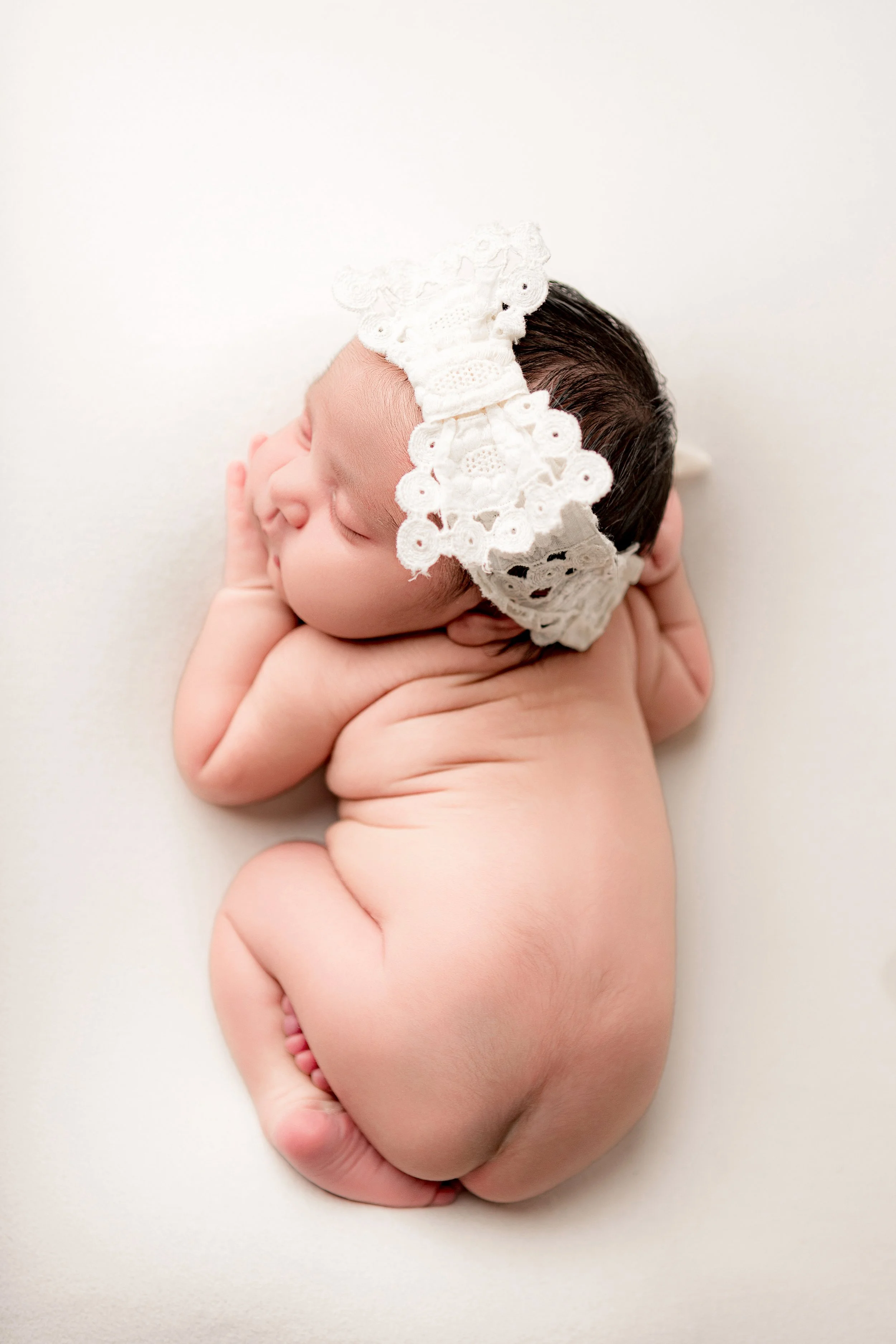 Newborn baby girl white natural pose Melbourne newborn photography South Morang