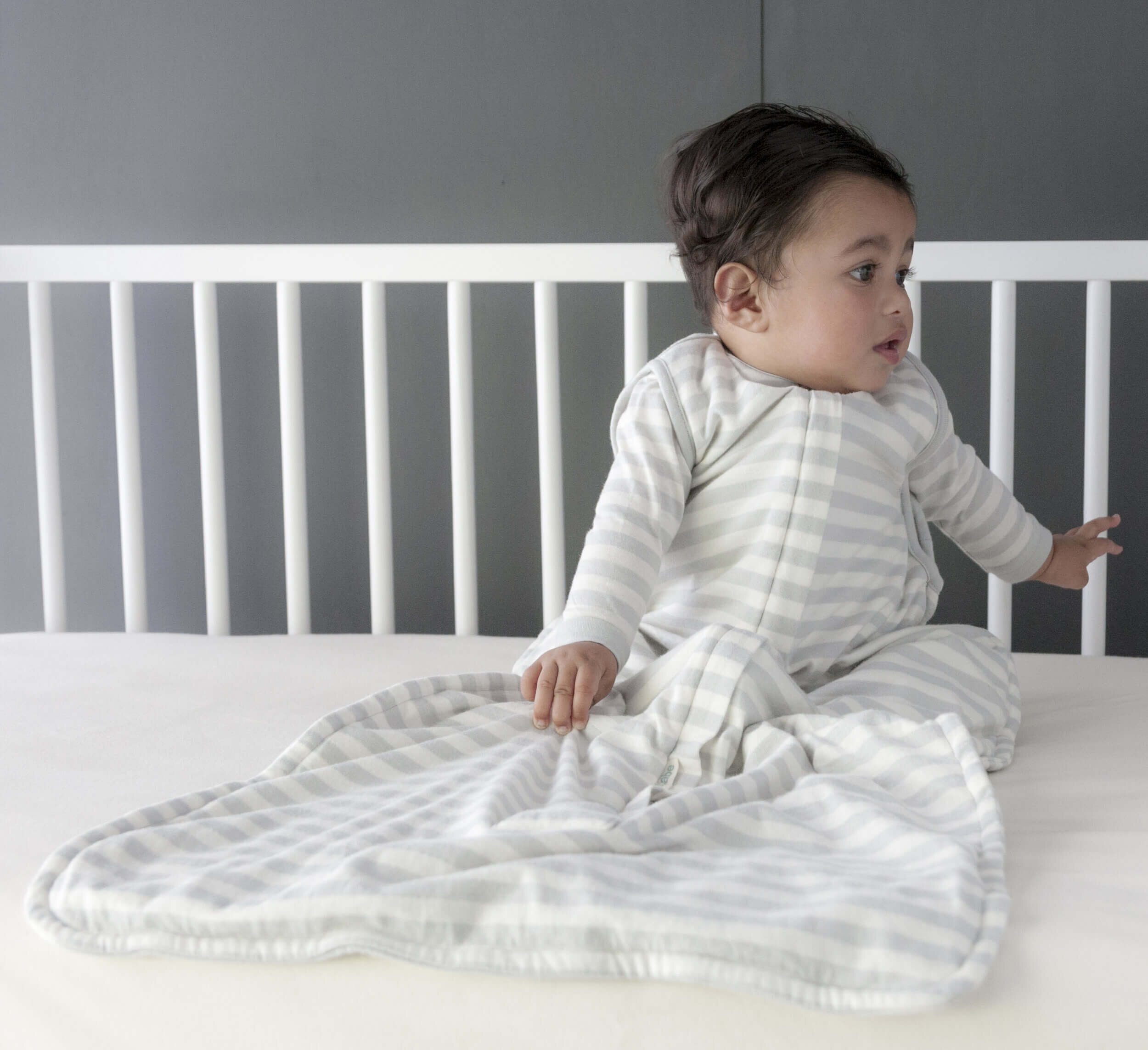 Woolbabe 3 seasons front zip sleeping bag in pebble from Queenstown baby shop