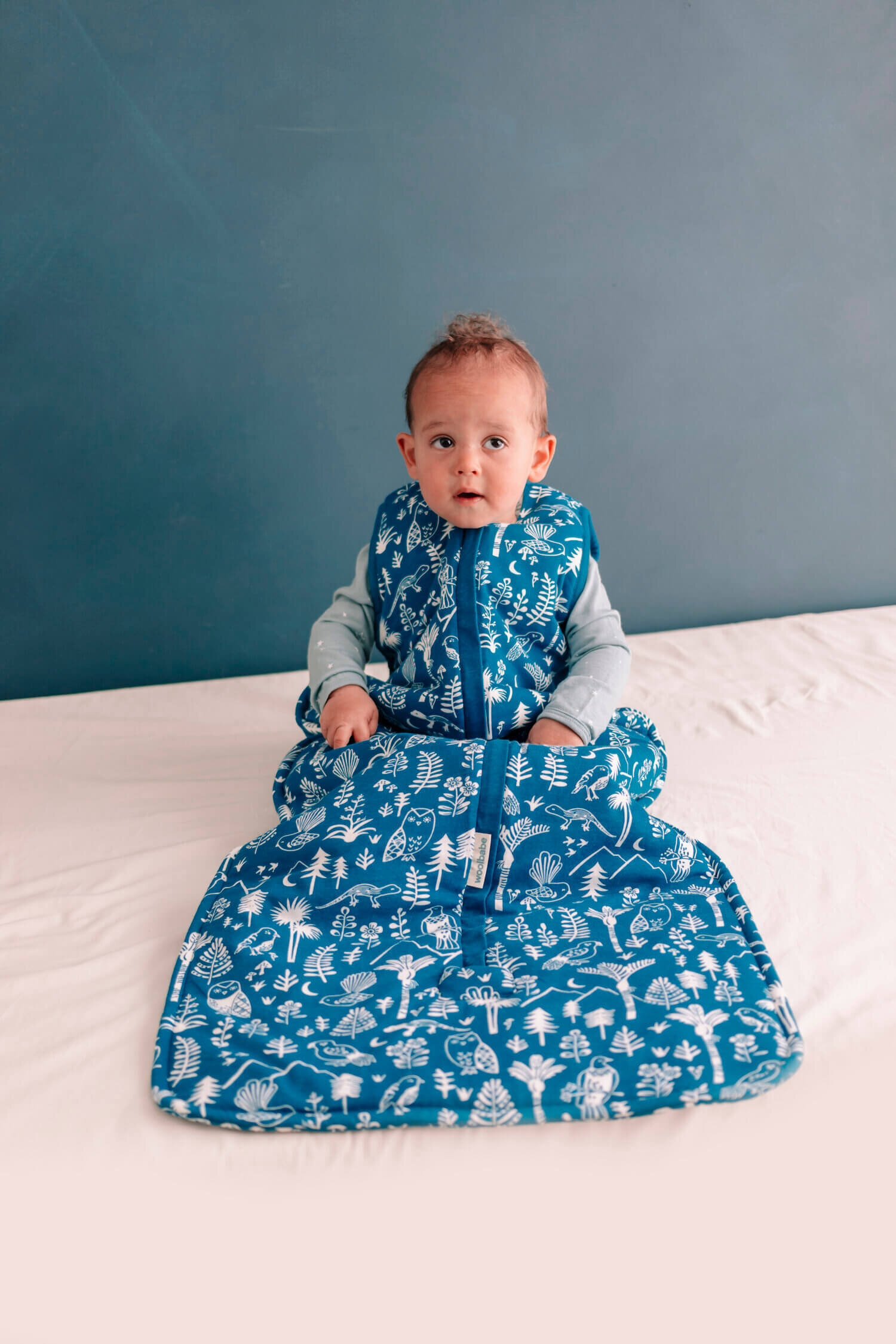 Woolbabe Duvet front zip sleeping bag in lake wilderness from Queenstown baby shop