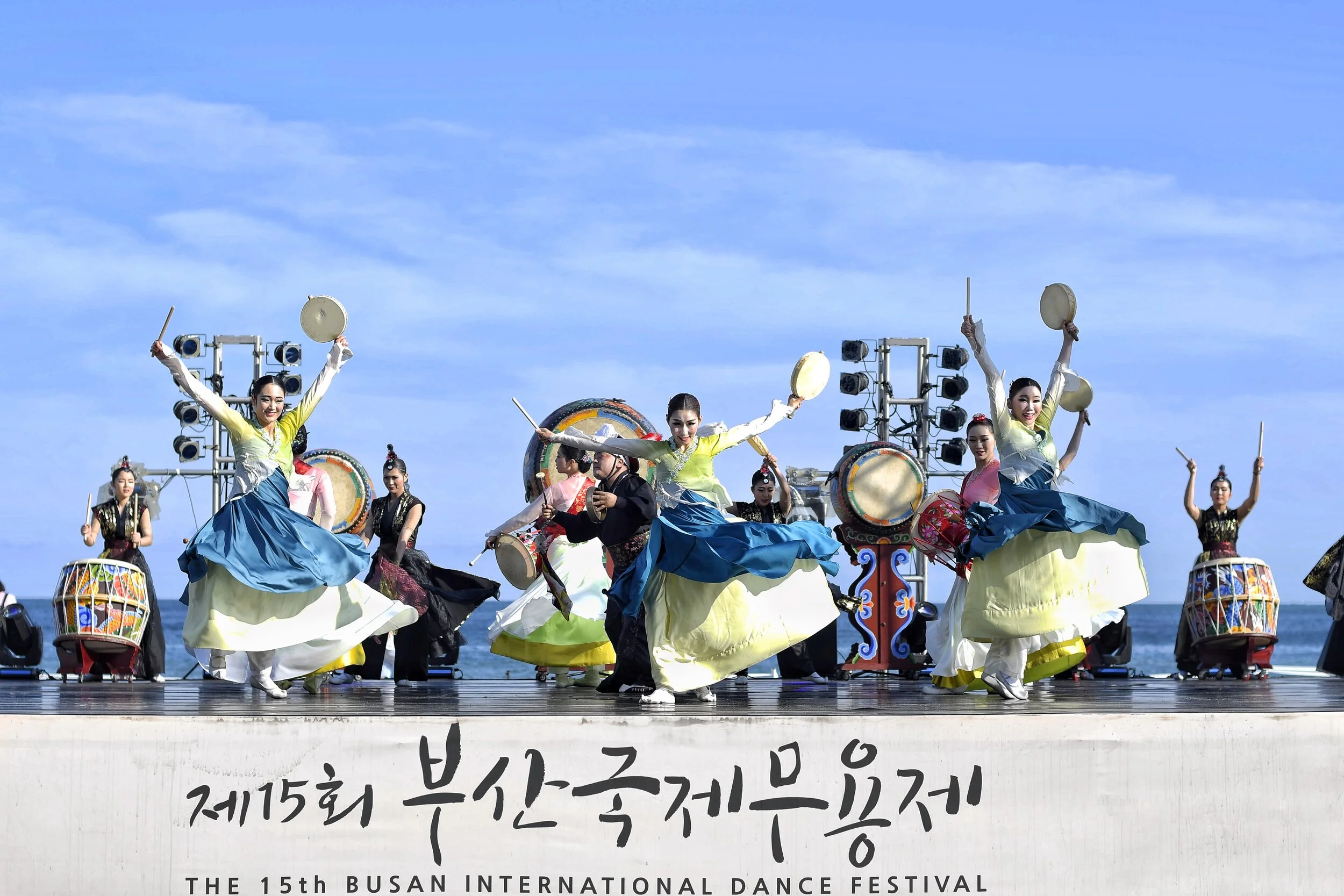Korean Musician/Dancers perform "Samulnori" a traditional Korean style  of drumming and dance at the Busan  International Dance  Festival  at Haeundae Beach  in Busan, South Korea 2019