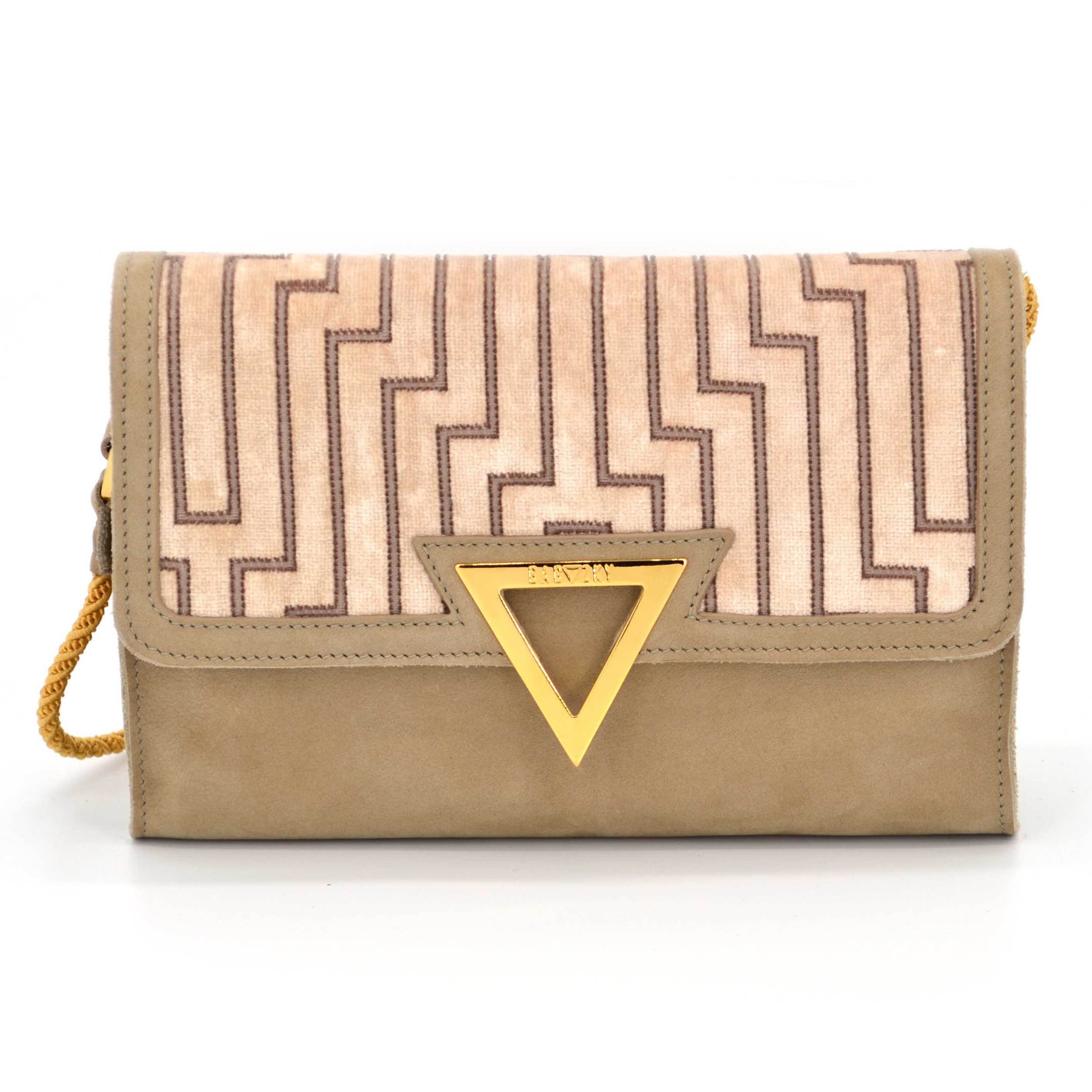 Front view of the Skyscraper Tappezzeria Clutch. It´s made from softest beige suede and combined with velvet upholstery fabric.