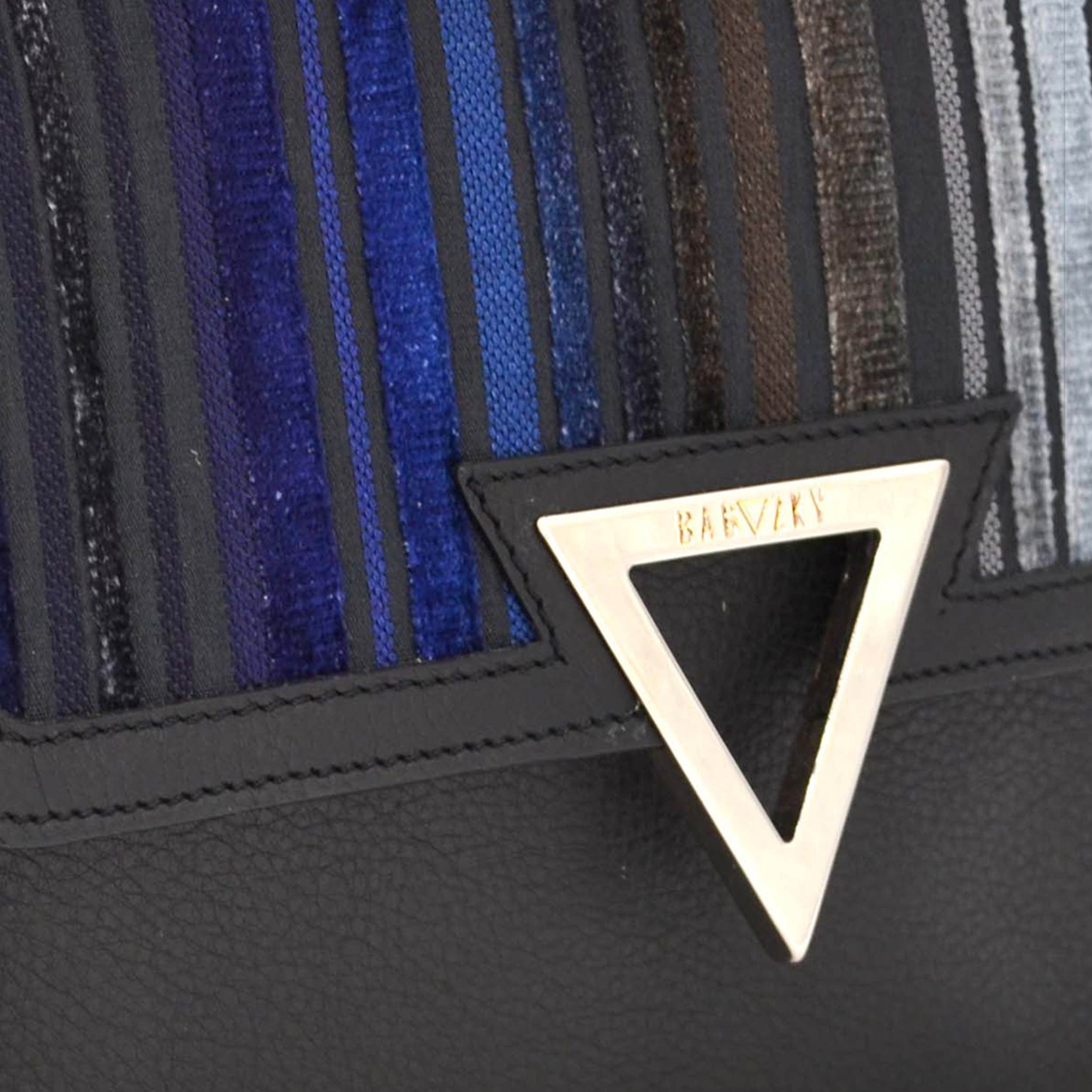 Detail of the palladium plated brass accessoire, with the Bagazky lettering engraved.